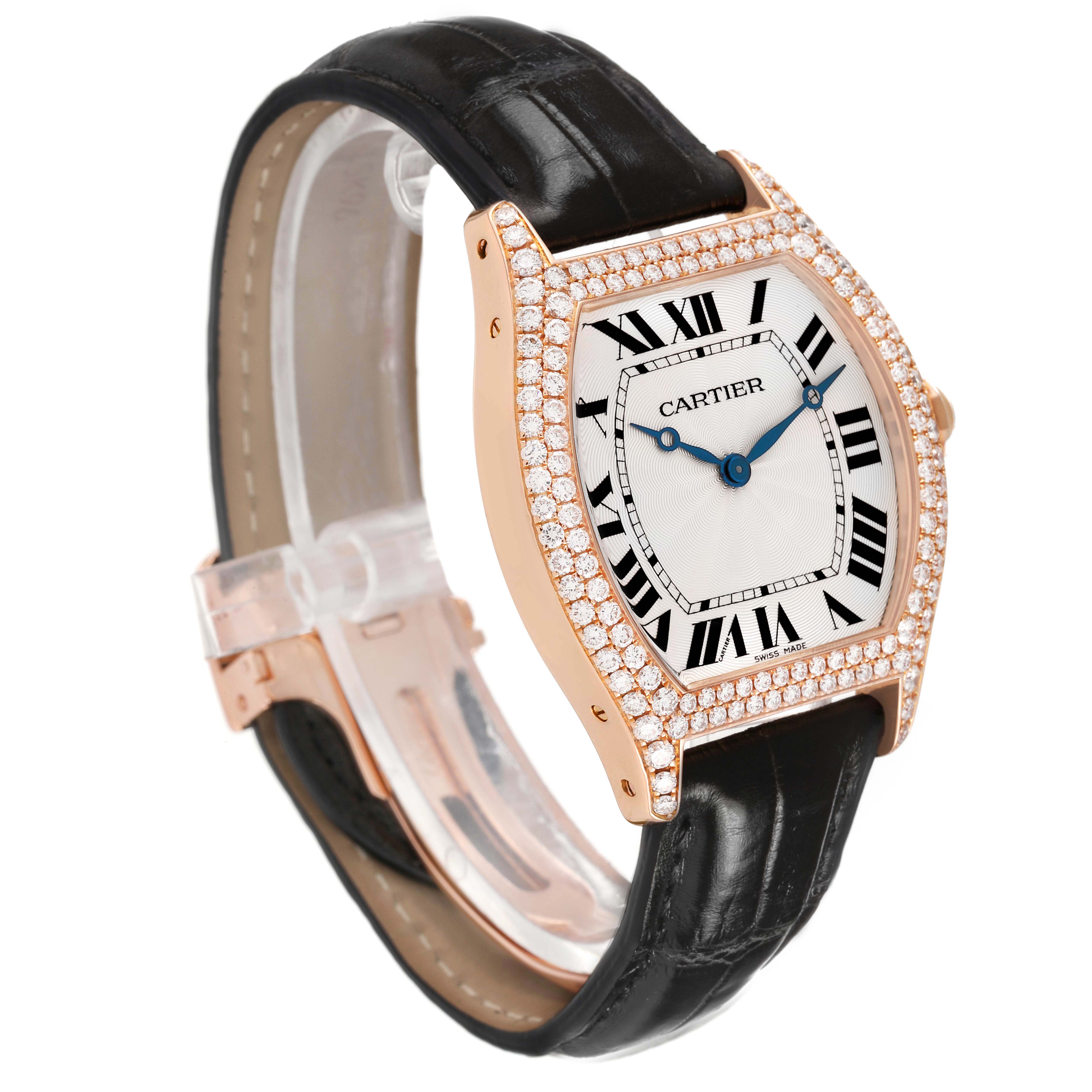 The Cartier Tortue WA503751 Women's Rose Gold Silver Dial watch is shown at a three-quarter angle, displaying its diamond-encrusted bezel, Roman numeral dial, and leather strap.