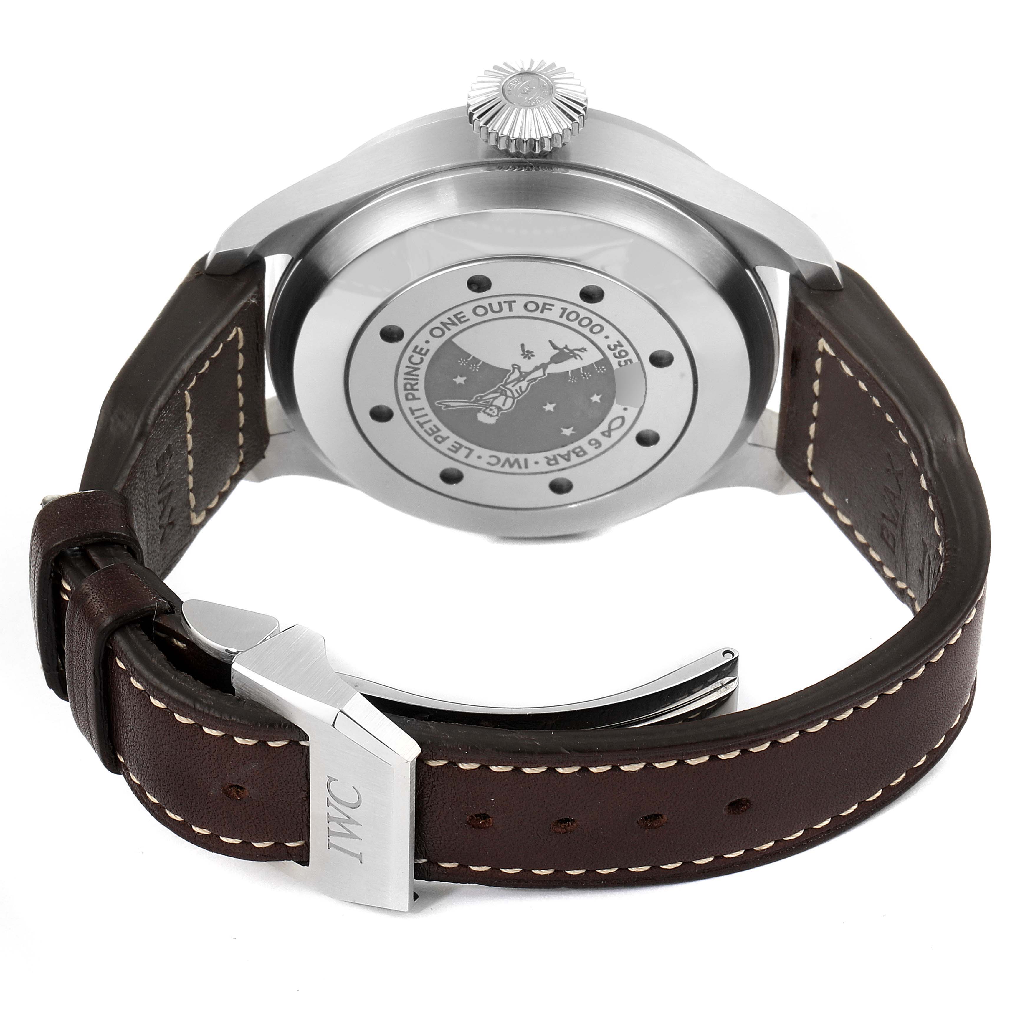 The image shows the rear view of the IWC Pilot IW500908 Men's Stainless Steel Blue Dial IW500908 Men's Stainless Steel Blue Dial model watch, highlighting the case back, crown, and leather strap with IWC-engraved buckle.