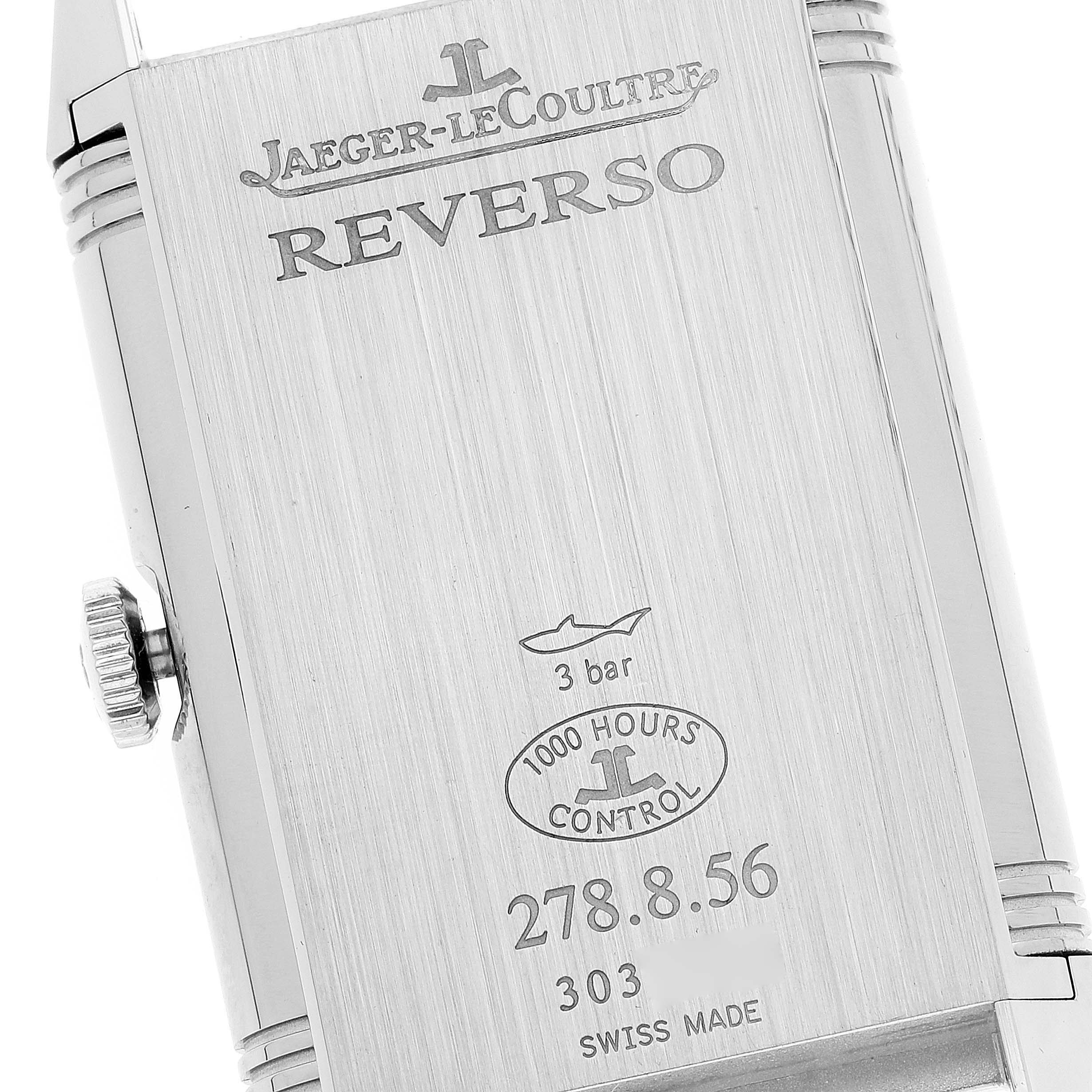 This image shows the back case and crown of a Jaeger LeCoultre Reverso Q3808420 Men's Stainless Steel Silver Dial Q3808420 Men's Stainless Steel Silver Dial watch, featuring engravings and hallmark details.