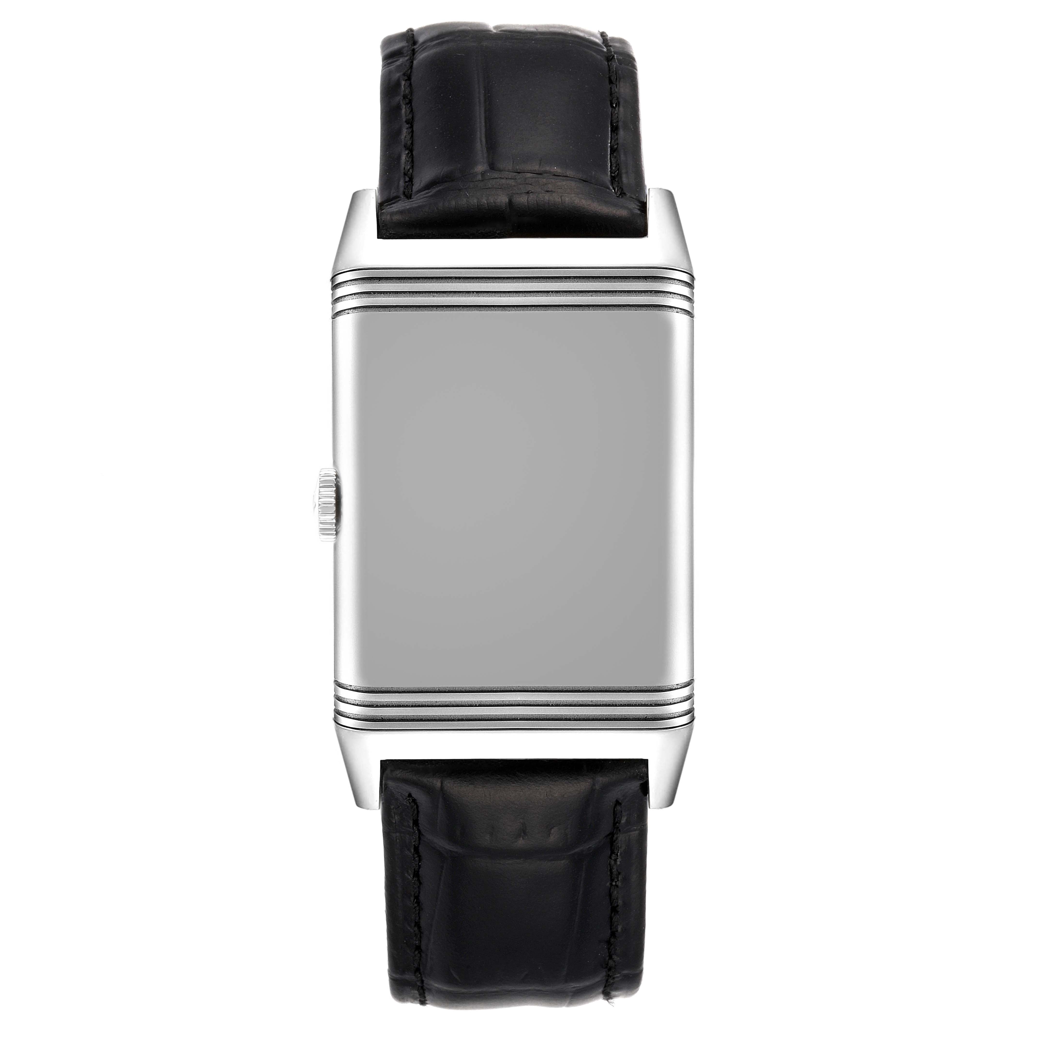 The image shows a front view of the Jaeger LeCoultre Reverso Q3808420 Men's Stainless Steel Silver Dial Q3808420 Men's Stainless Steel Silver Dial watch, showcasing its rectangular case and black leather strap.