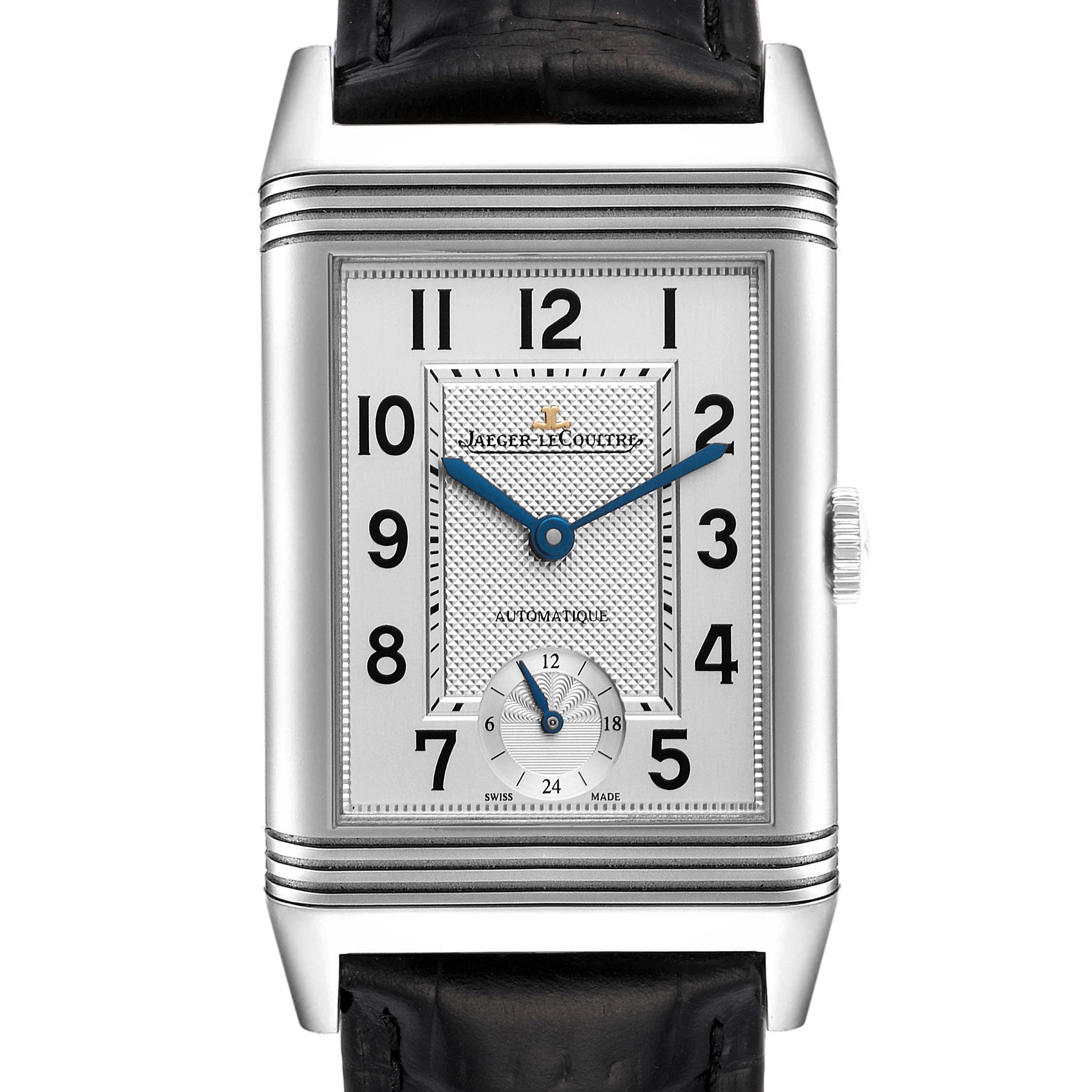 The image shows a front view of the Jaeger-LeCoultre Reverso watch, highlighting its rectangular dial, blue hands, and leather strap.