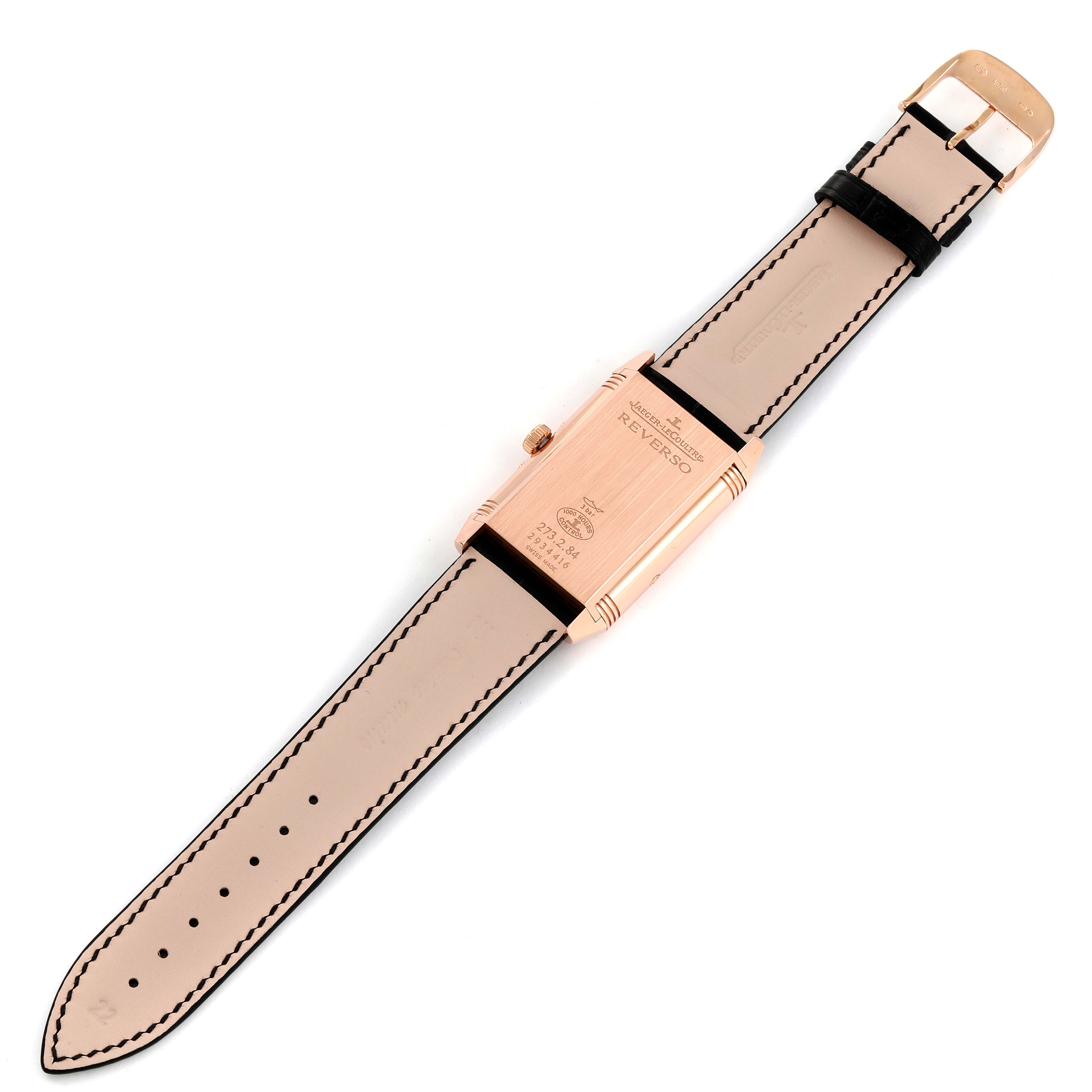 This image shows the back view of a Jaeger LeCoultre Reverso Q3752520 Men's Rose Gold Silver Dial Q3752520 Men's Rose Gold Silver Dial watch, displaying its leather strap and engravings on the case.