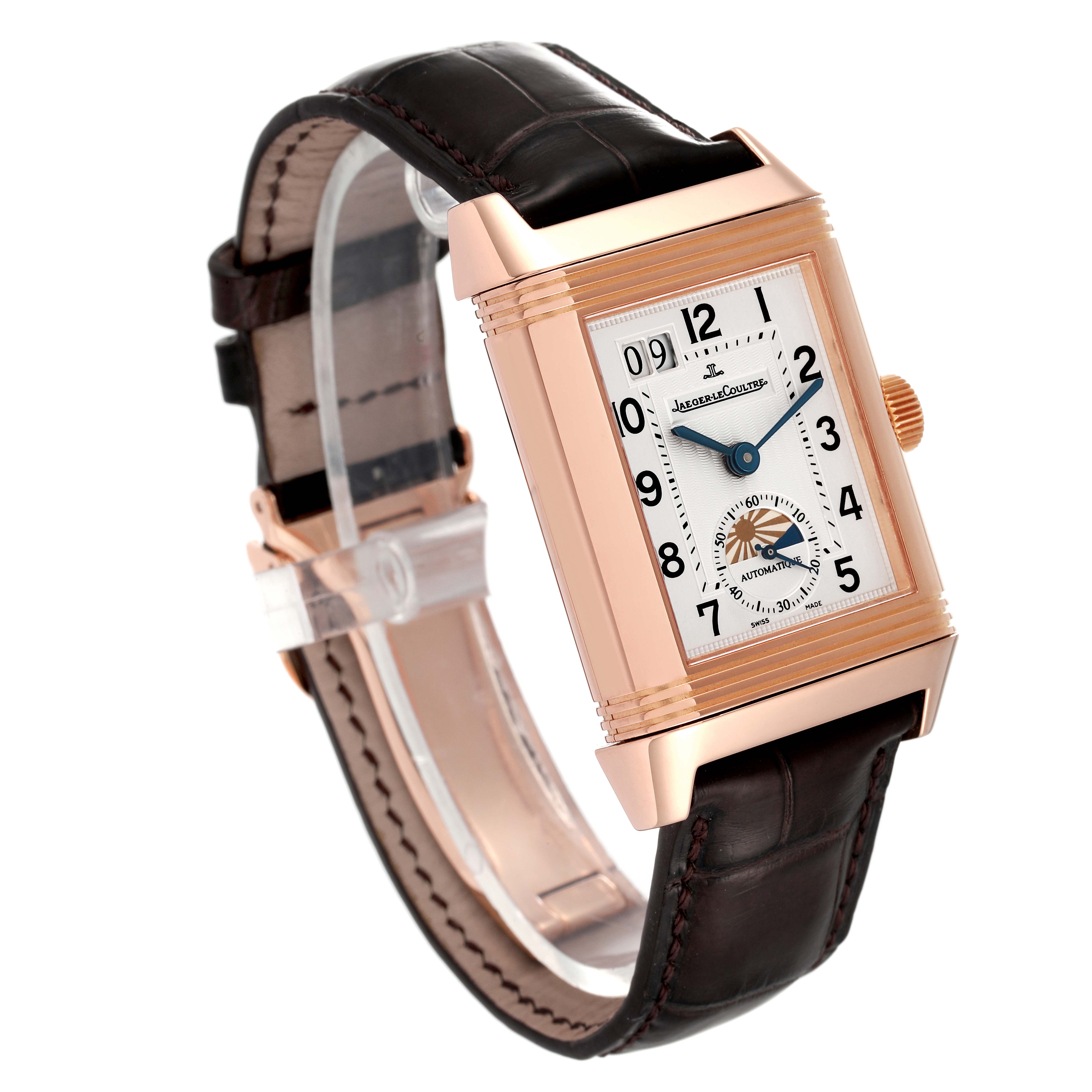 The image shows a Jaeger LeCoultre Reverso Q3032420 Men
s Rose Gold Silver Dial Q3032420 Men
s Rose Gold Silver Dial watch at a three-quarter angle, displaying the face, strap, and crown.