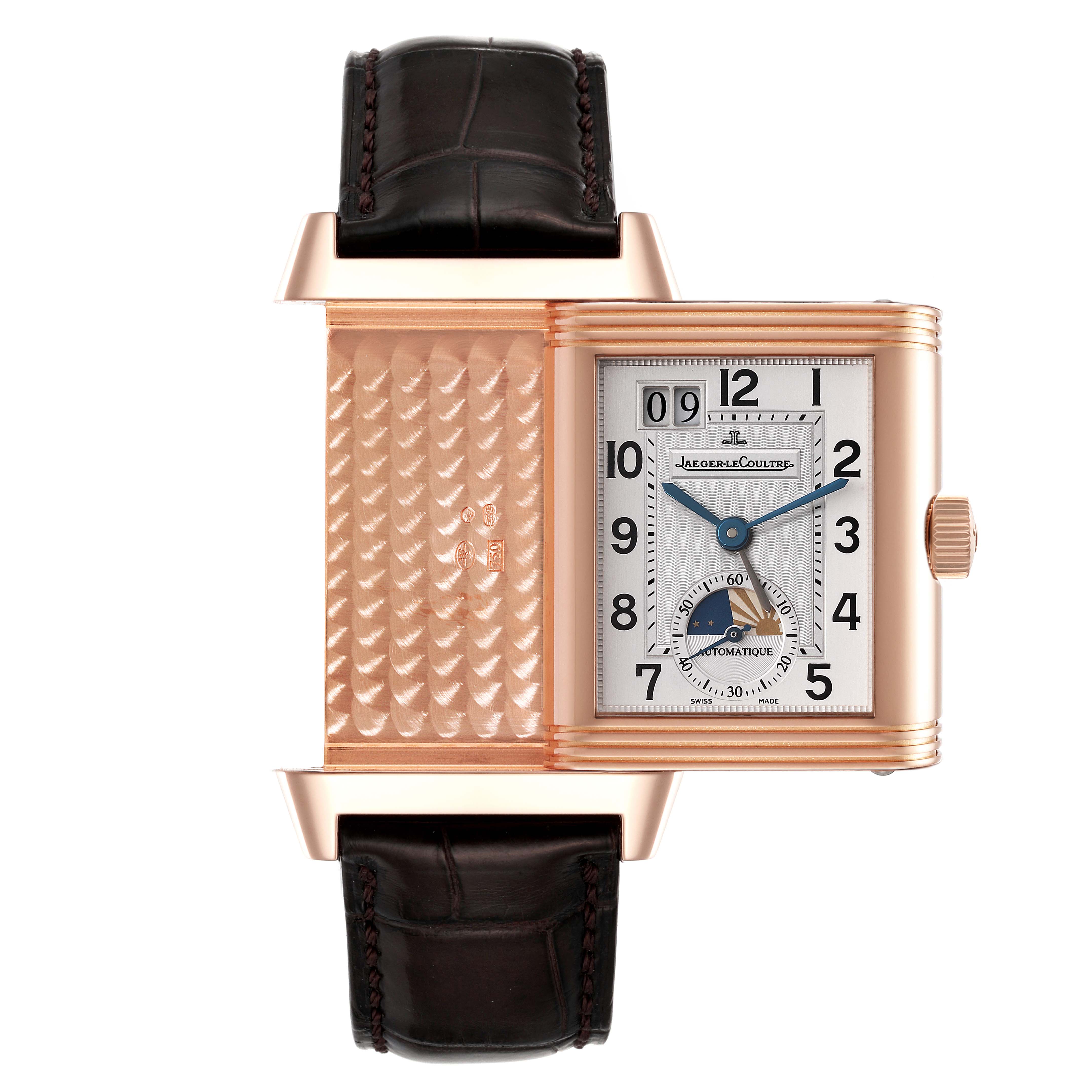 This image shows a Jaeger LeCoultre Reverso Q3032420 Men
s Rose Gold Silver Dial Q3032420 Men
s Rose Gold Silver Dial watch with its reversible case open, revealing the dial and decorative reverse side.