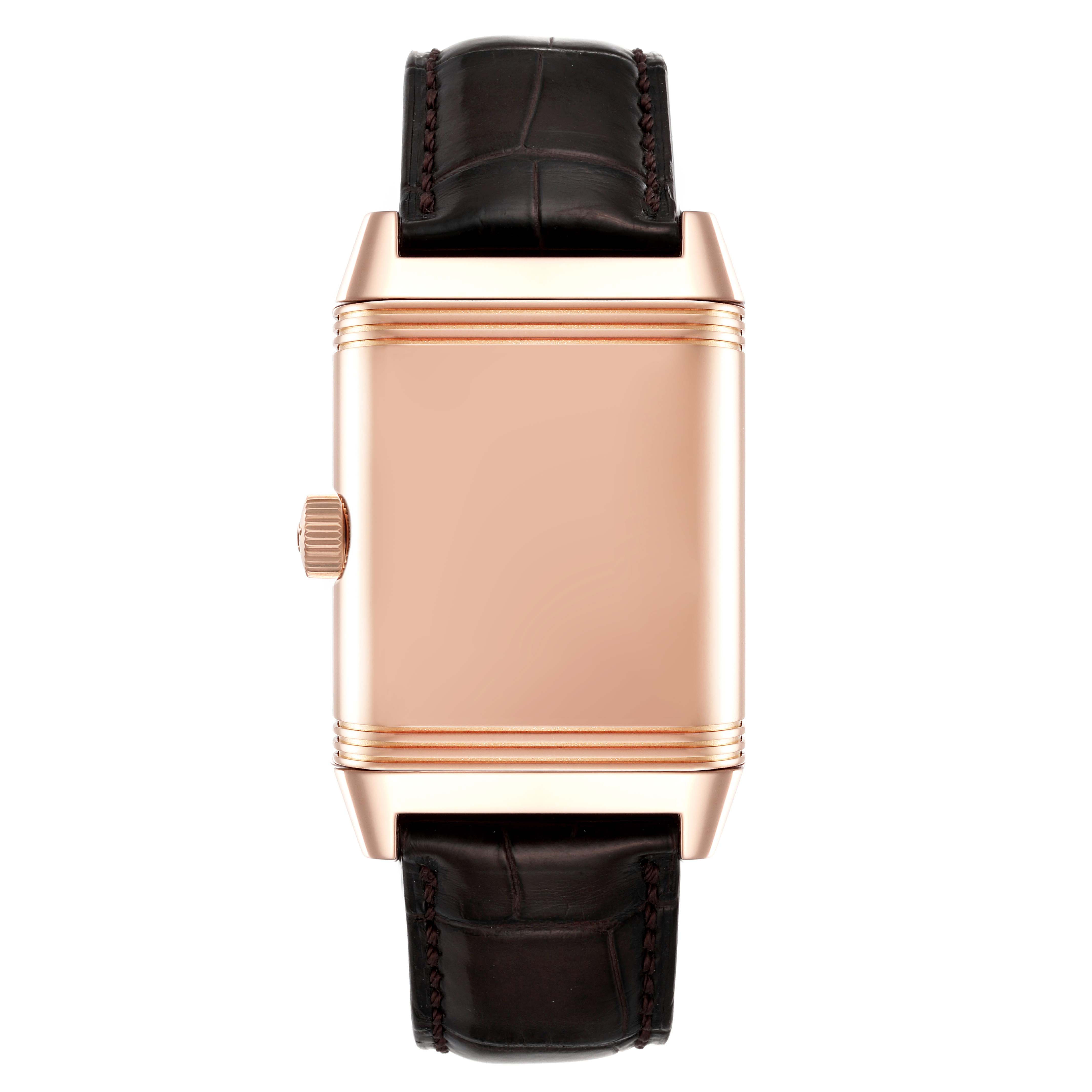 This image shows the front view of a Jaeger-LeCoultre Reverso watch with the case back displayed and the crown on the left side.