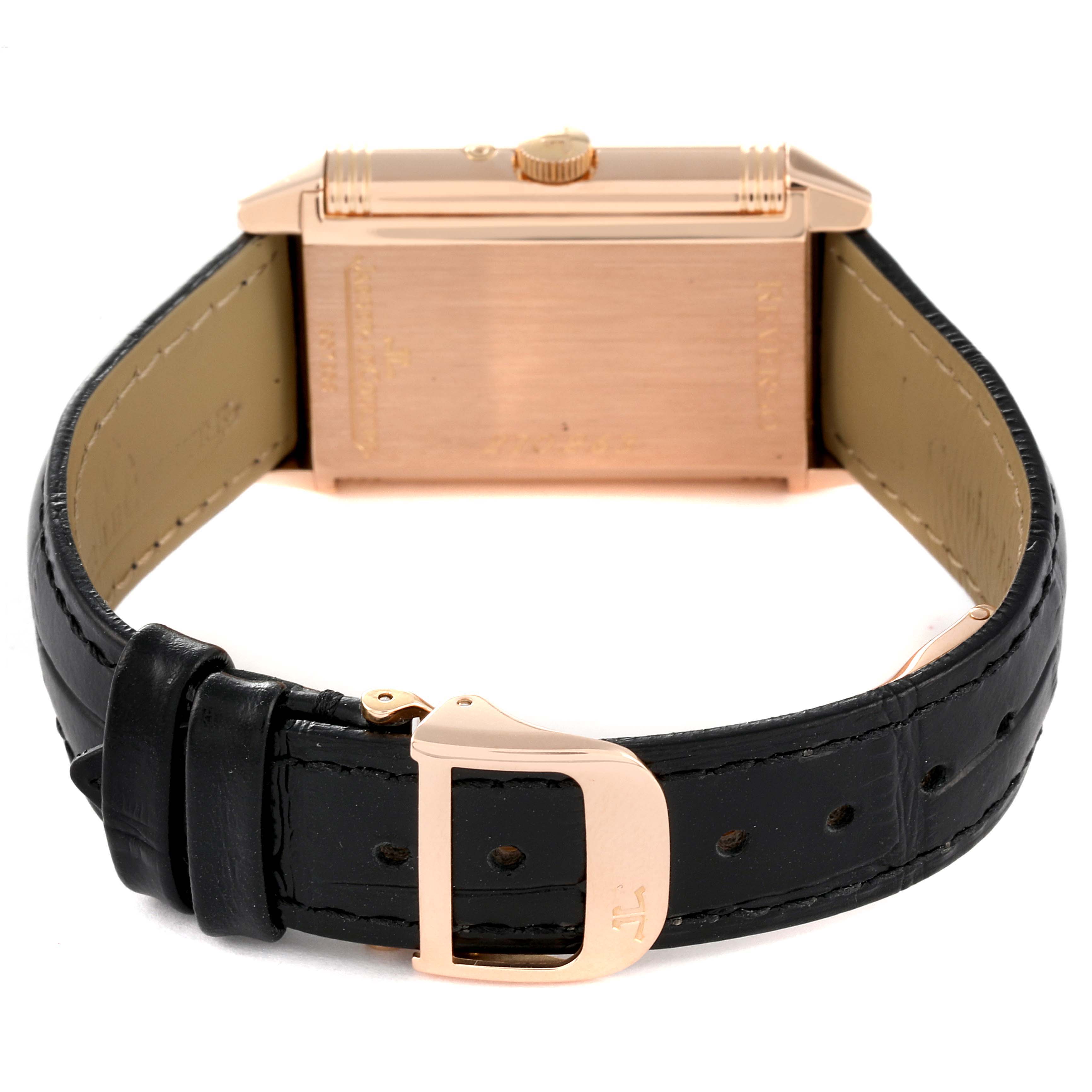 The image shows the back case and leather strap of a Jaeger LeCoultre Reverso Q2752420 Men
s Rose Gold Silver Dial Q2752420 Men
s Rose Gold Silver Dial watch from a rear angle.