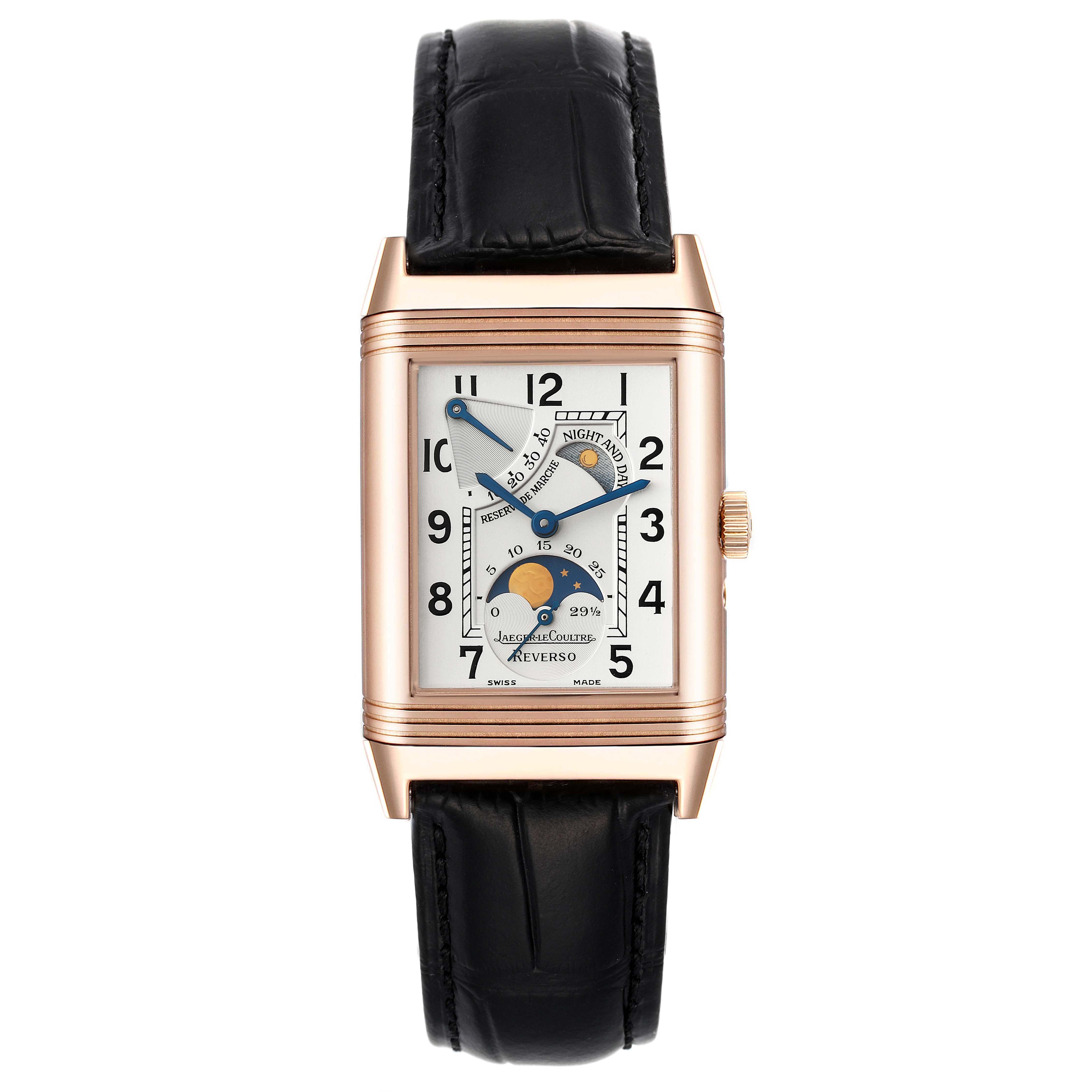 The image shows a front view of a Jaeger-LeCoultre Reverso watch, featuring a rectangular dial, black leather strap, and moon phase subdial.