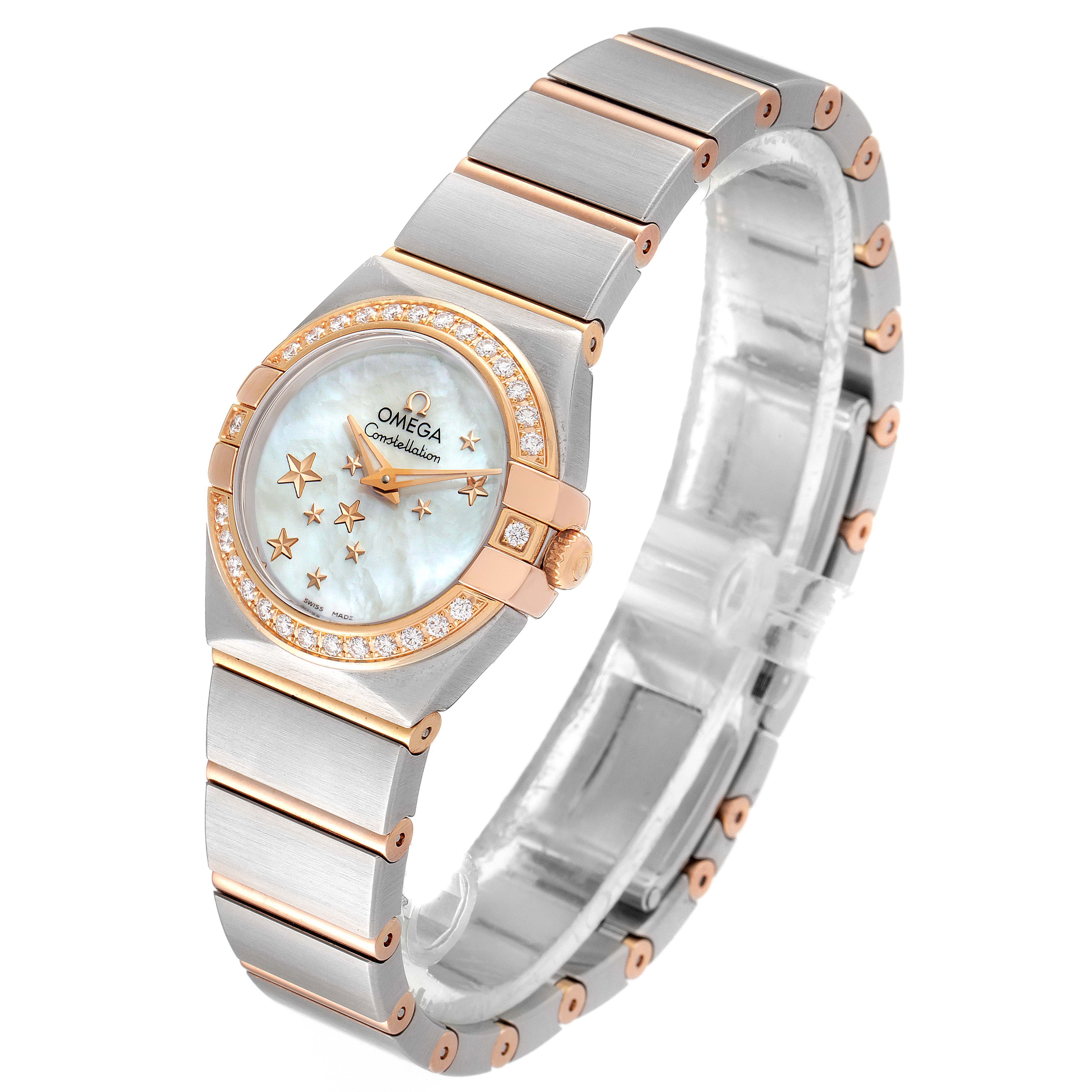 The image shows the Omega 123.25.24.60.05.002 Women's Steel and Gold (two tone) Mother of Pearl Dial 123.25.24.60.05.002 Women's Steel and Gold (two tone) Mother of Pearl Dial Constellation Star Steel Rose Gold Diamond Ladies Watch 123.25.24.60.05.002 from a top-left angle, showing the dial, bezel, and part of the bracelet.