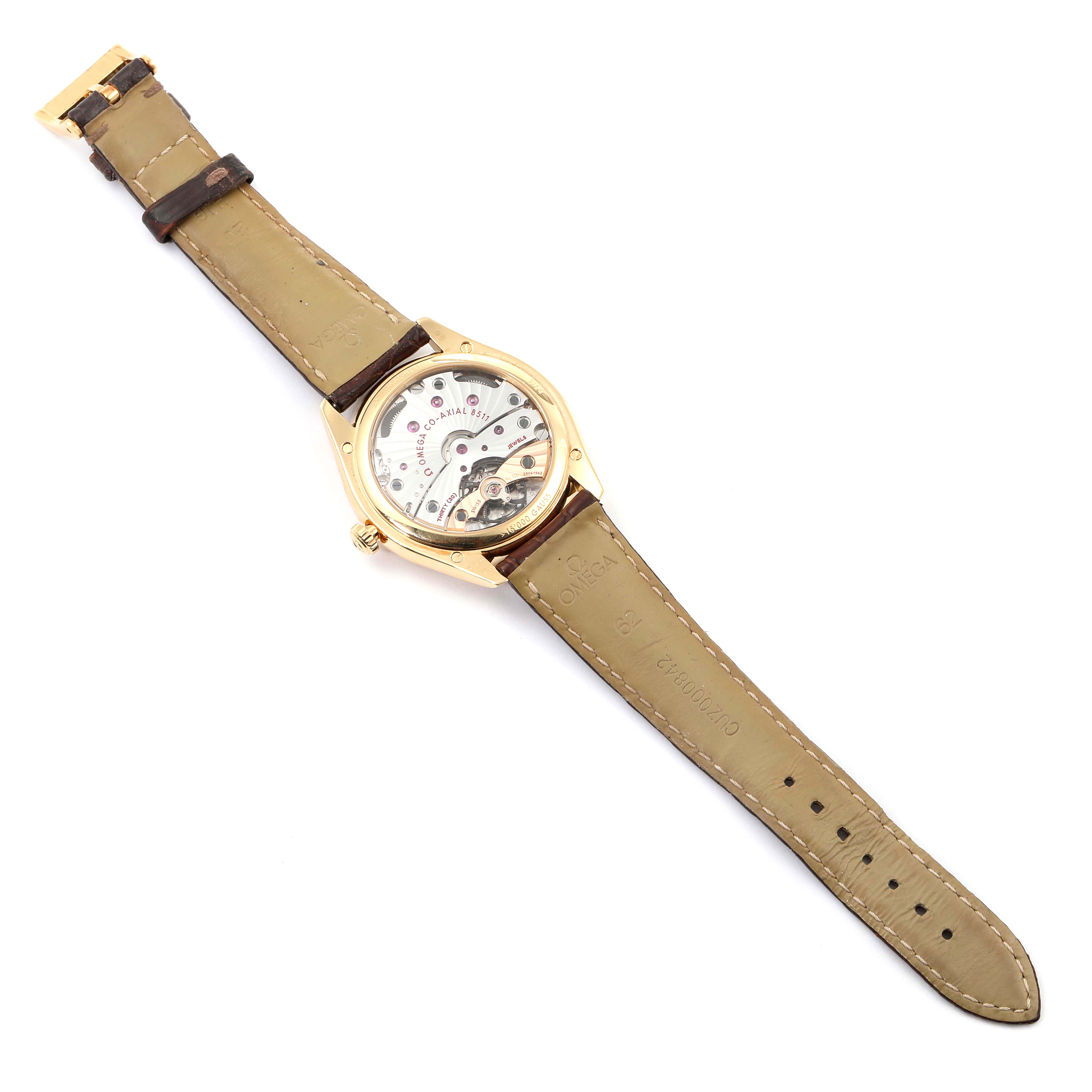 This image shows the back view of the Omega De Ville 432.53.40.21.02.001 Men's Yellow Gold Silver Dial 432.53.40.21.02.001 Men's Yellow Gold Silver Dial watch, revealing its exposed mechanical movement and leather strap.