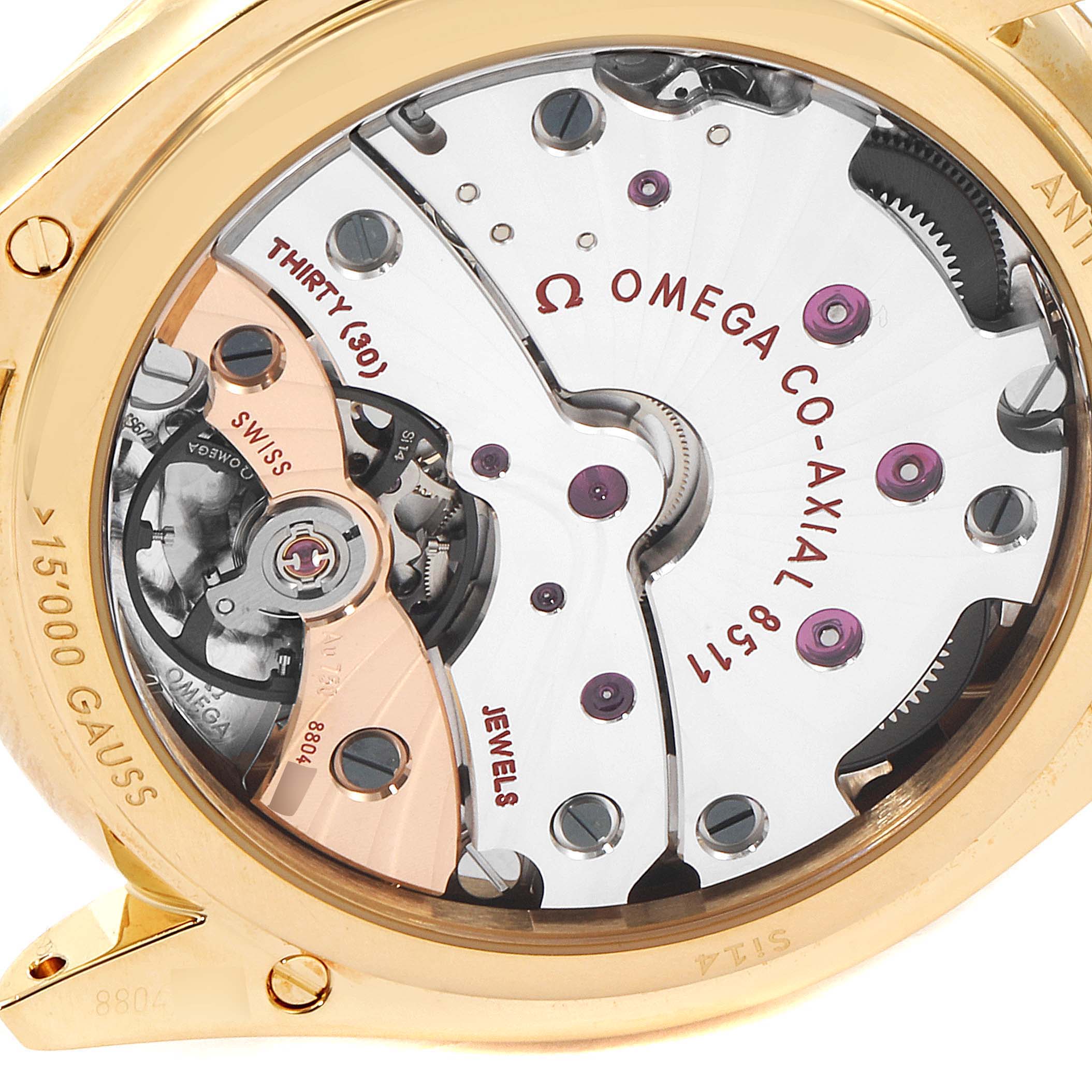 This image shows a close-up of the back of the Omega De Ville 432.53.40.21.02.001 Men's Yellow Gold Silver Dial 432.53.40.21.02.001 Men's Yellow Gold Silver Dial watch, highlighting its intricate co-axial movement.