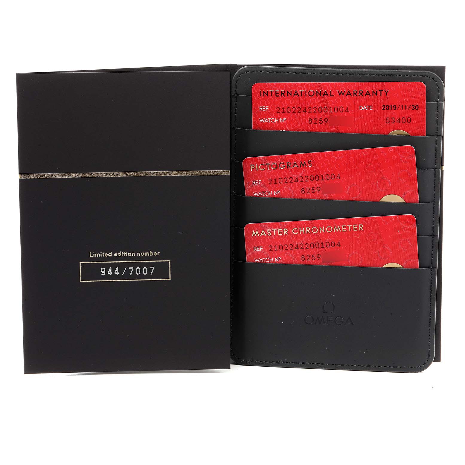 The image shows the warranty cards and documentation for an Omega Seamaster 210.22.42.20.01.004 Men's Stainless Steel Black Dial 210.22.42.20.01.004 Men's Stainless Steel Black Dial, including an international warranty, pictograms, and a master chronometer card.