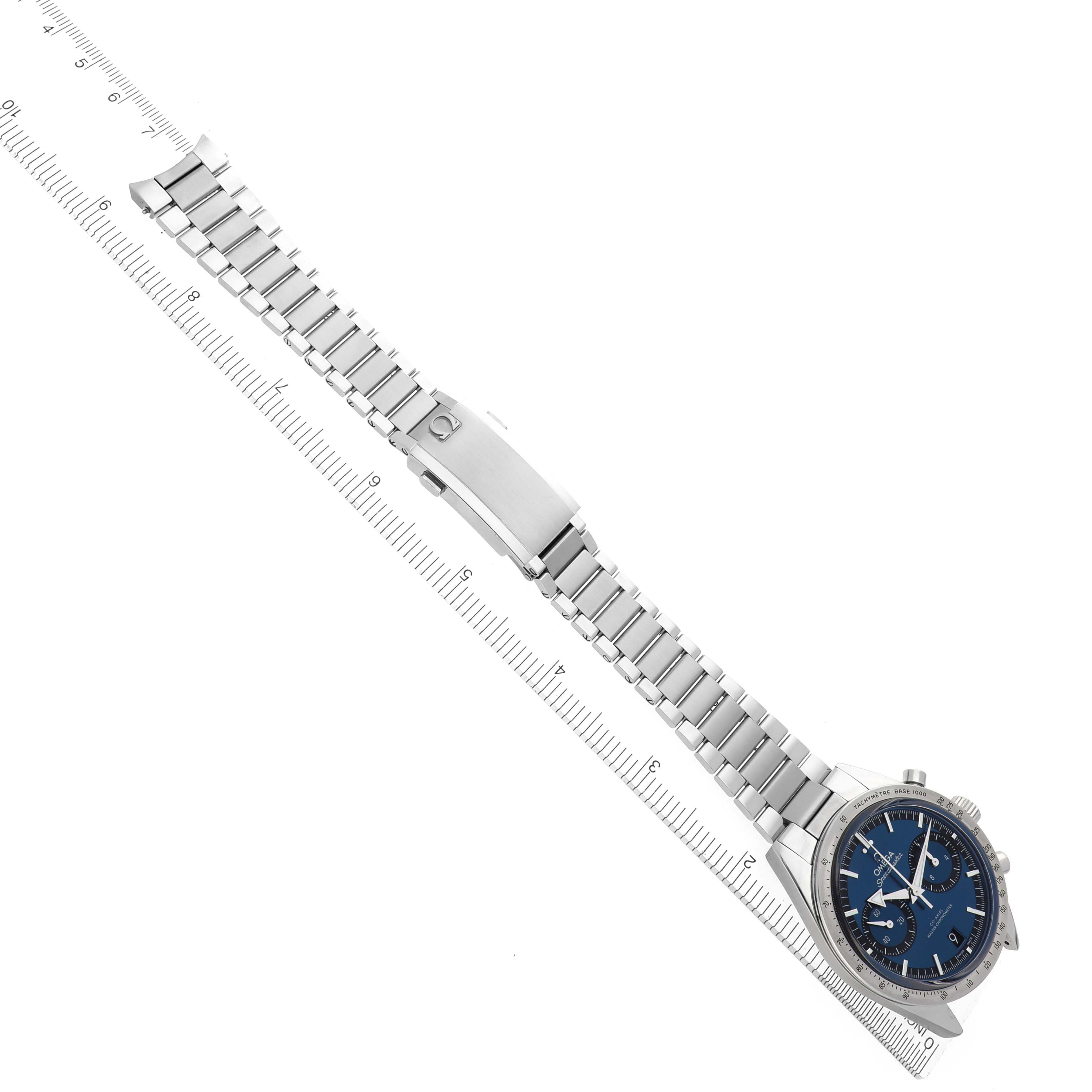 The Omega Speedmaster 332.10.41.51.03.001 Men's Stainless Steel Blue Dial watch is shown diagonally, highlighting its face, bezel, and full metal bracelet with a clasp.