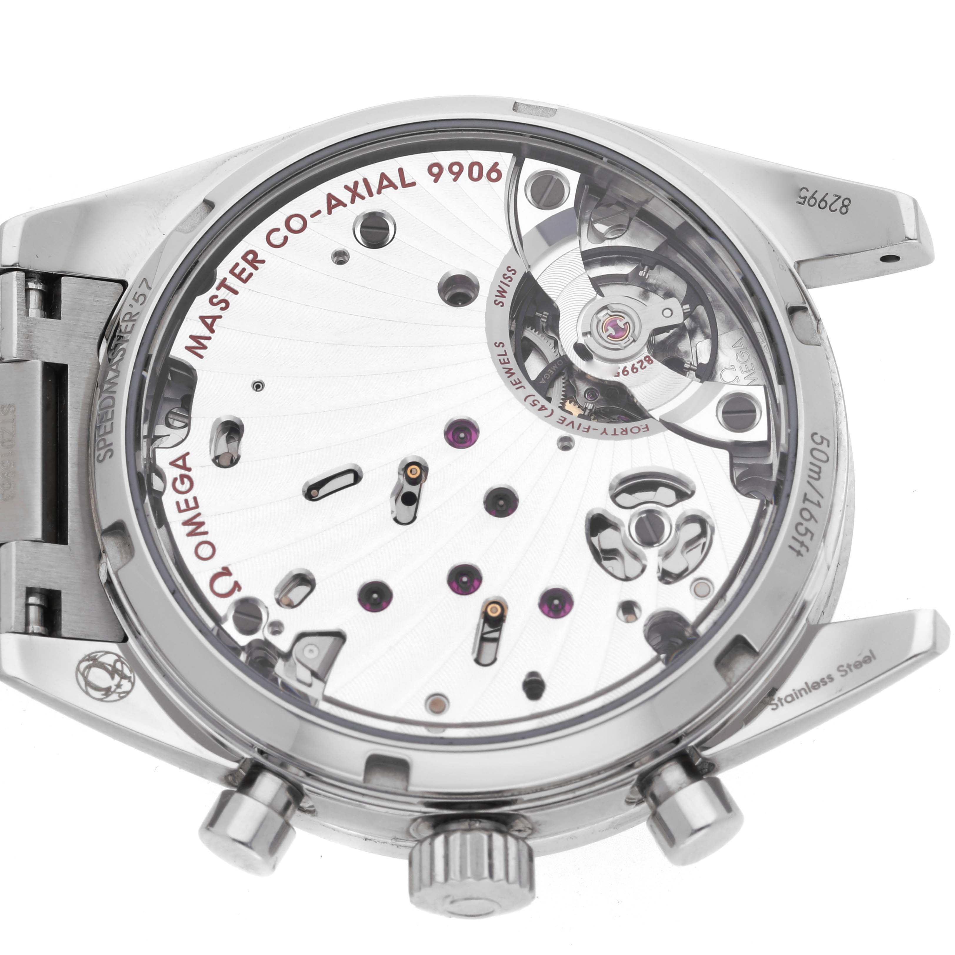 The image shows the back of an Omega Speedmaster 332.10.41.51.03.001 Men's Stainless Steel Blue Dial, displaying its Master Co-Axial 9906 movement.