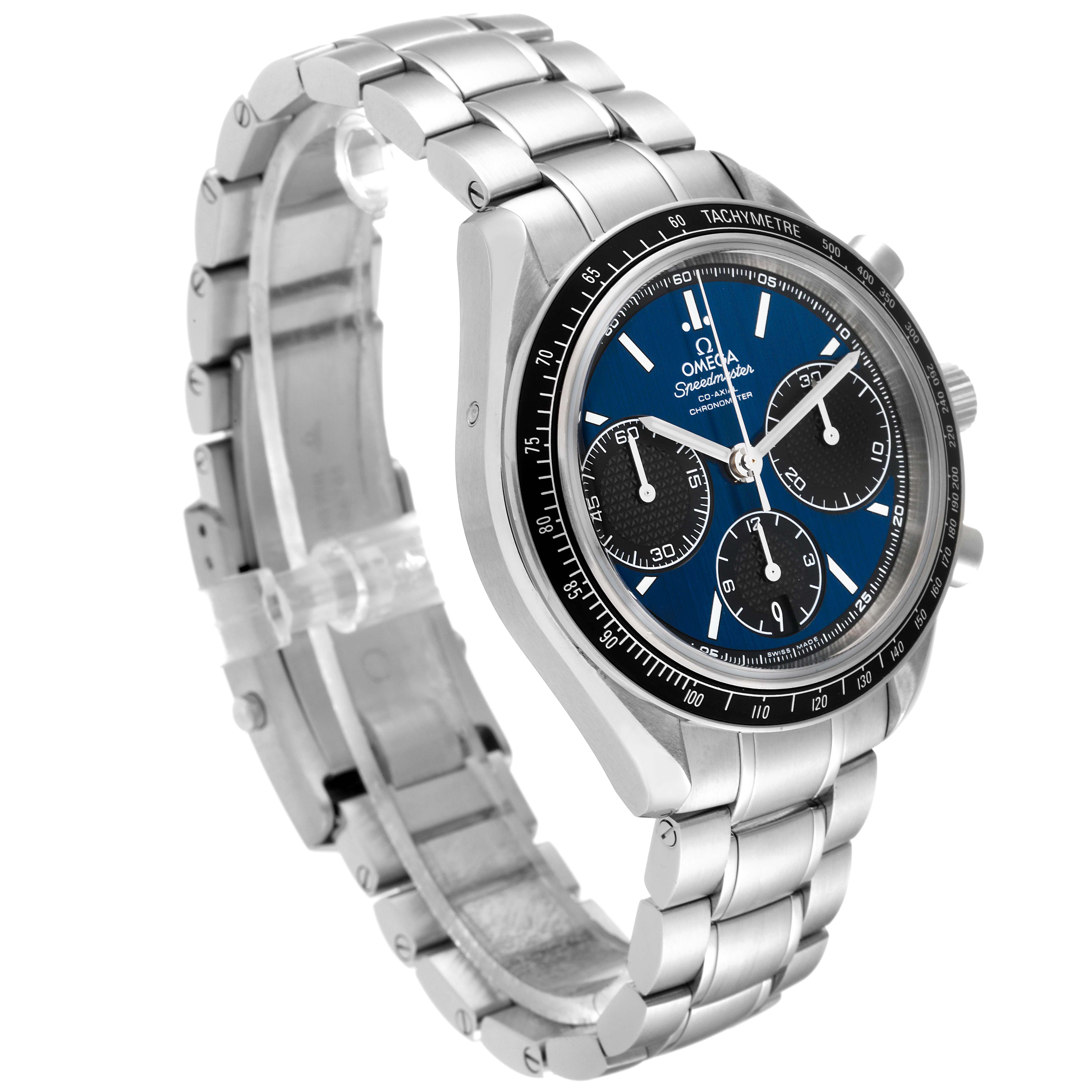 The Omega Speedmaster 326.30.40.50.03.001 Men
s Stainless Steel Blue Dial 326.30.40.50.03.001 Men
s Stainless Steel Blue Dial watch is shown from a three-quarter angle, displaying the face, bezel, and metal bracelet.