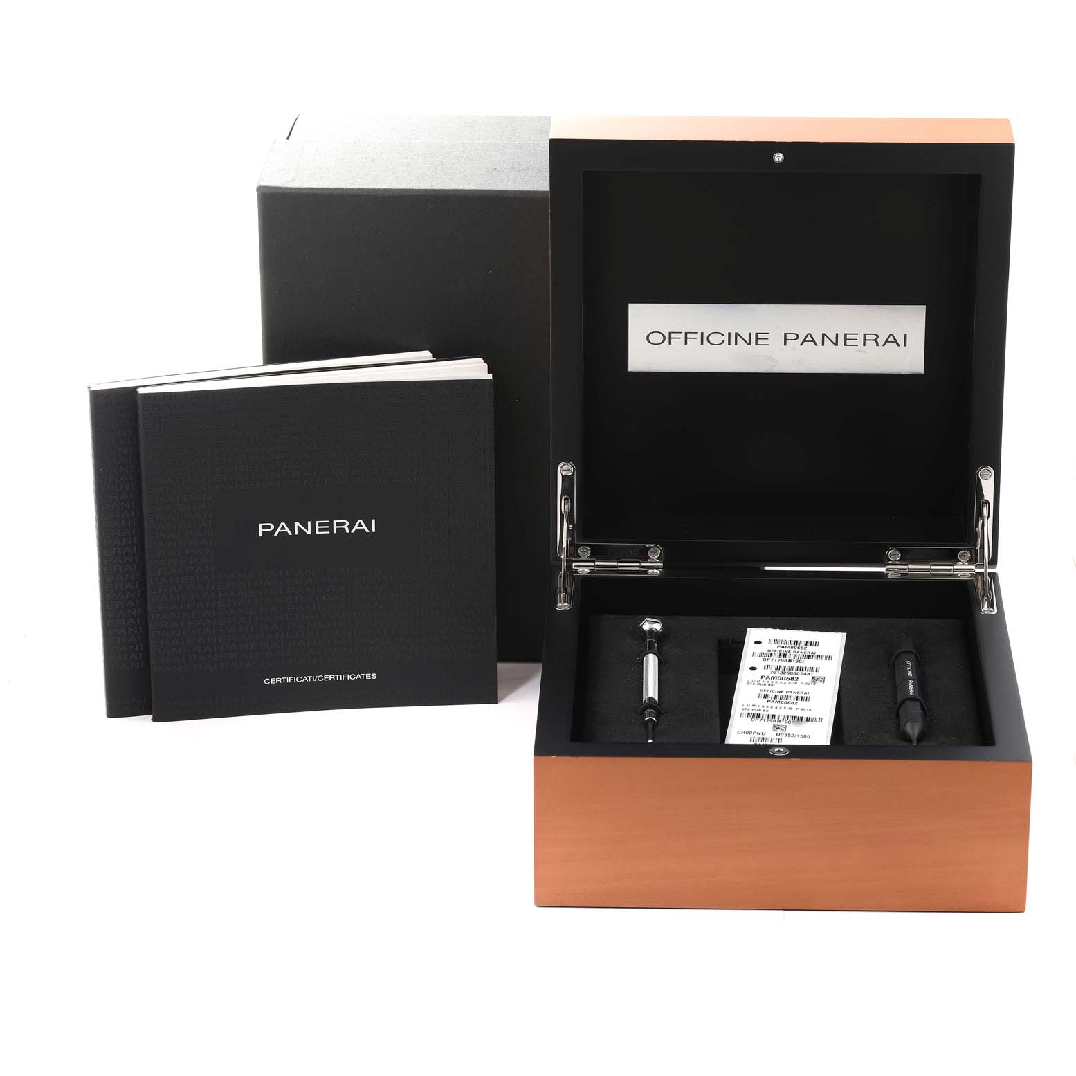 The image shows the box, tools, and certificates for the Panerai Submersible PAM00682 Men
s Stainless Steel Black Dial PAM00682 Men
s Stainless Steel Black Dial model watch, viewed from the front.