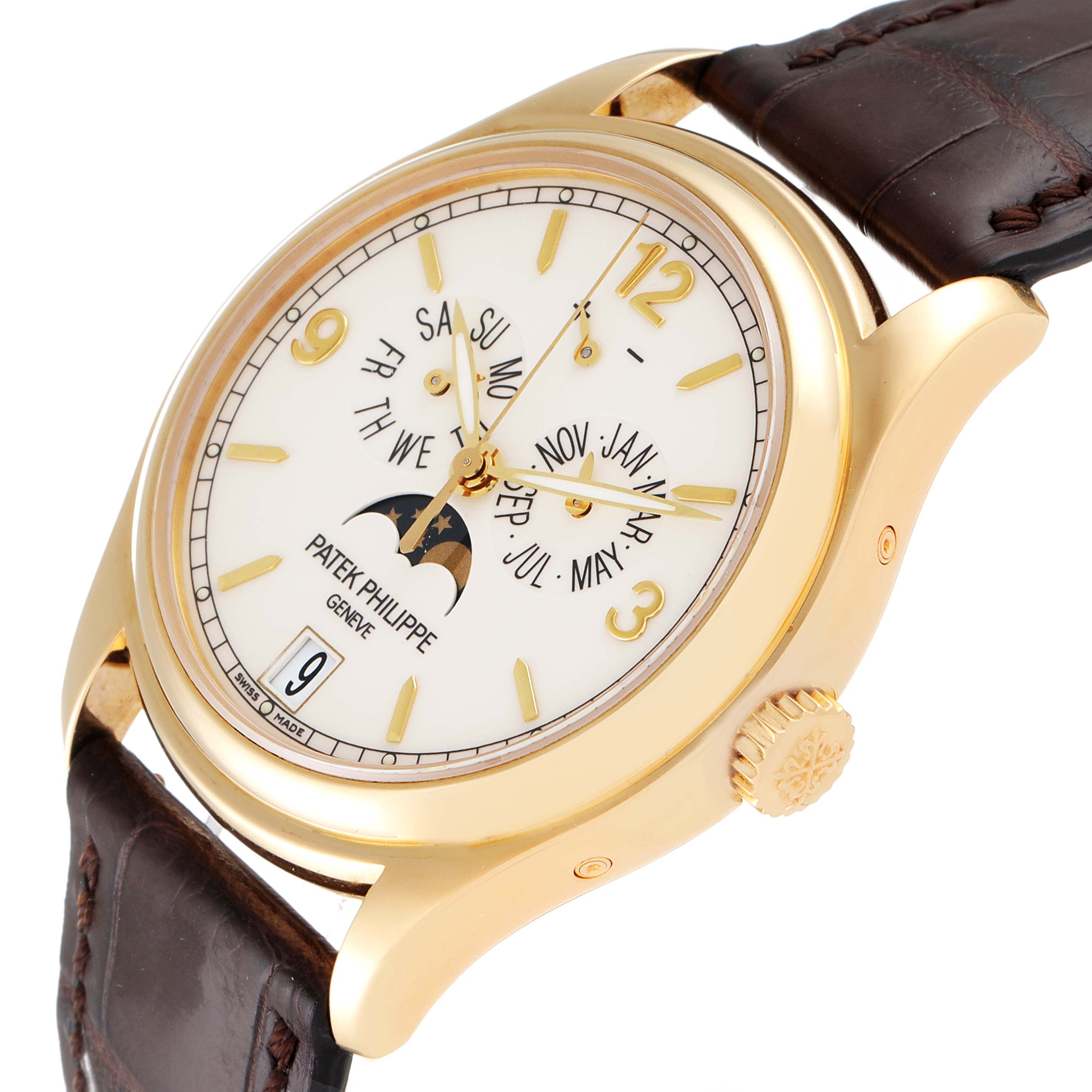 This image shows the Patek Philippe Complications 5146J Men's Yellow Gold Beige Dial 5146J Men's Yellow Gold Beige Dial watch at a three-quarter angle, highlighting the dial, crown, and part of the leather strap.