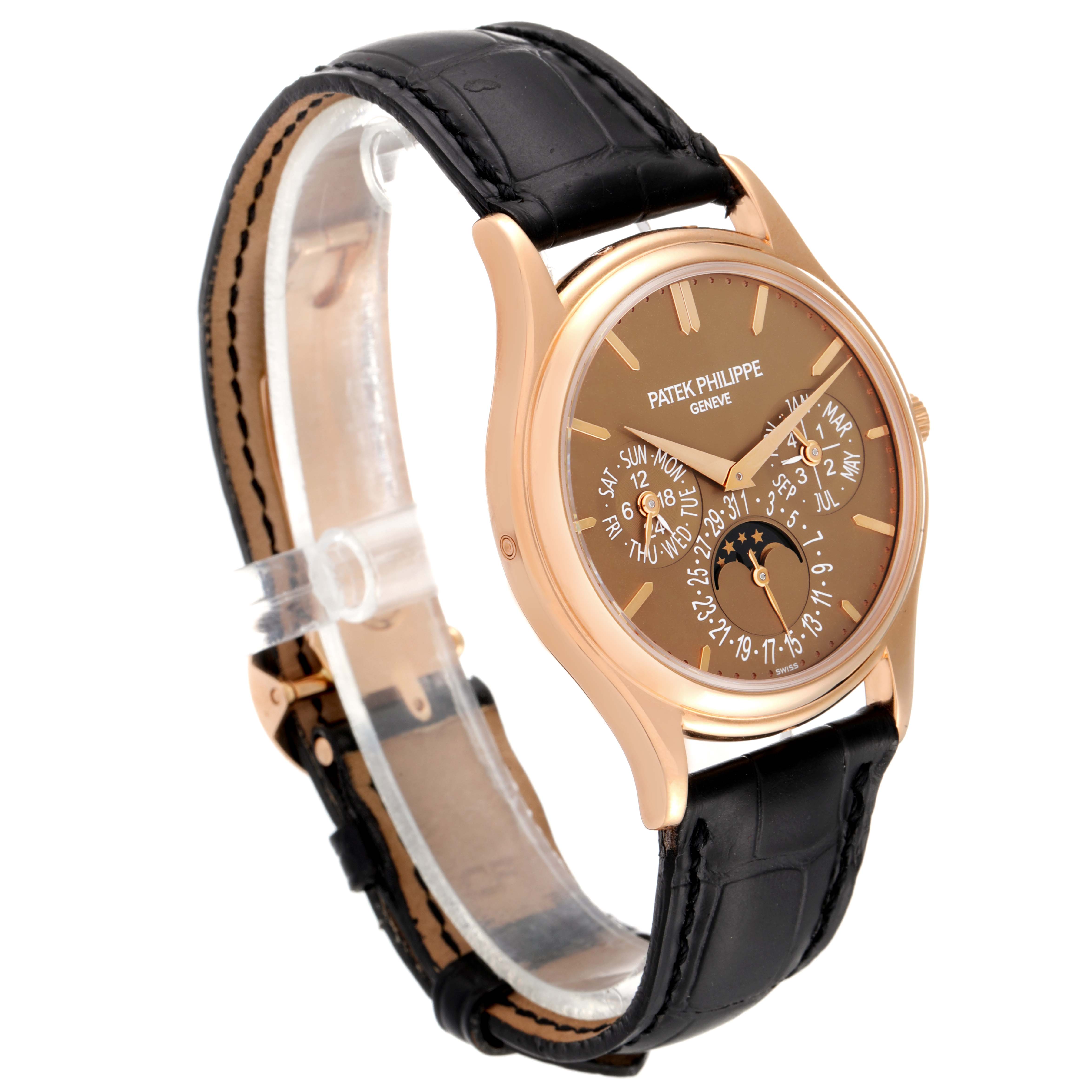 The Patek Philippe Complications 5140R-001 Men's Rose Gold Brown Dial 5140R-001 Men's Rose Gold Brown Dial model watch is shown at a slight angle, highlighting its dial, case, crown, and leather strap.
