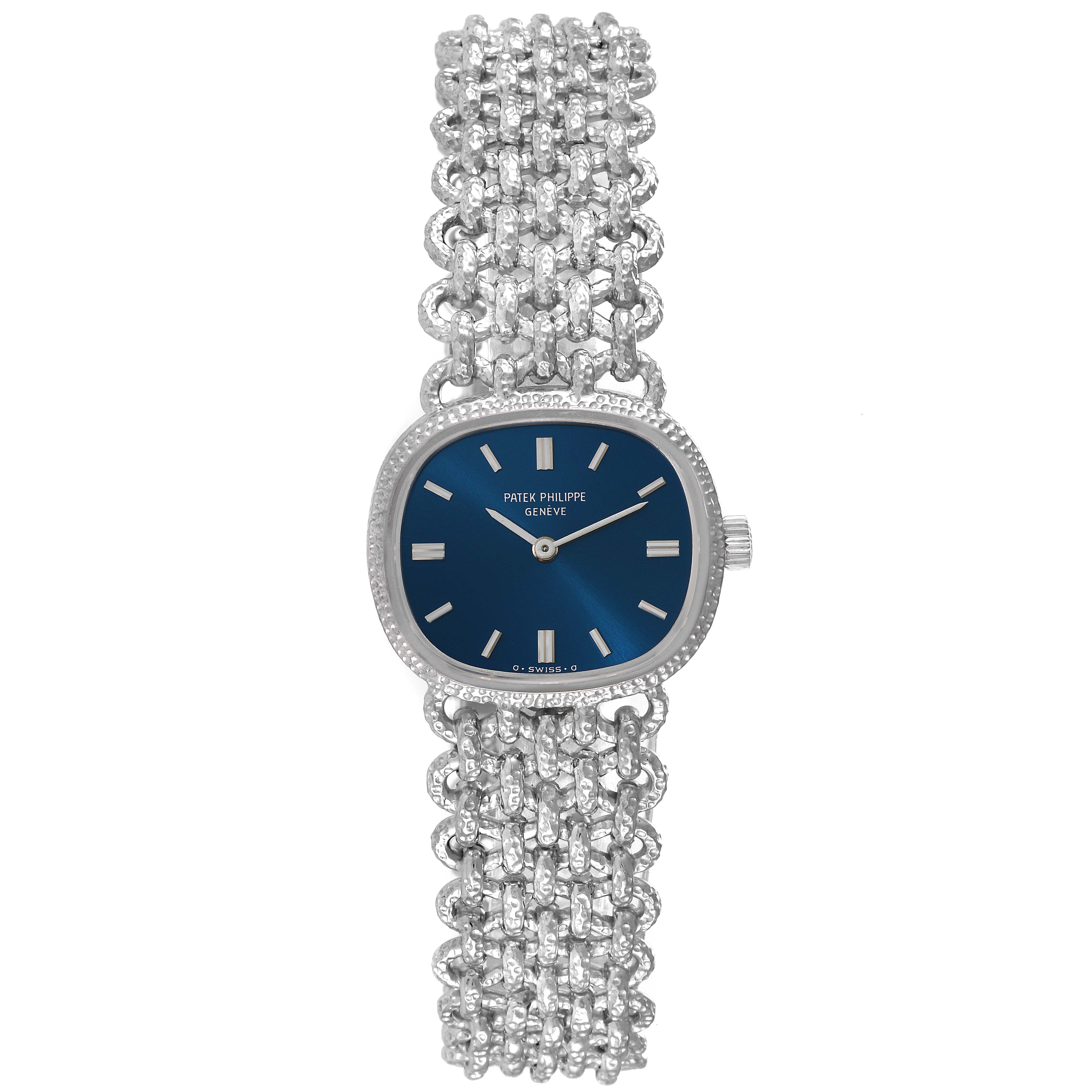 The image shows a front view of the Patek Philippe Golden Ellipse 4133 Women's White Gold Blue Dial 4133 Women's White Gold Blue Dial watch, highlighting its blue dial and intricate silver bracelet.