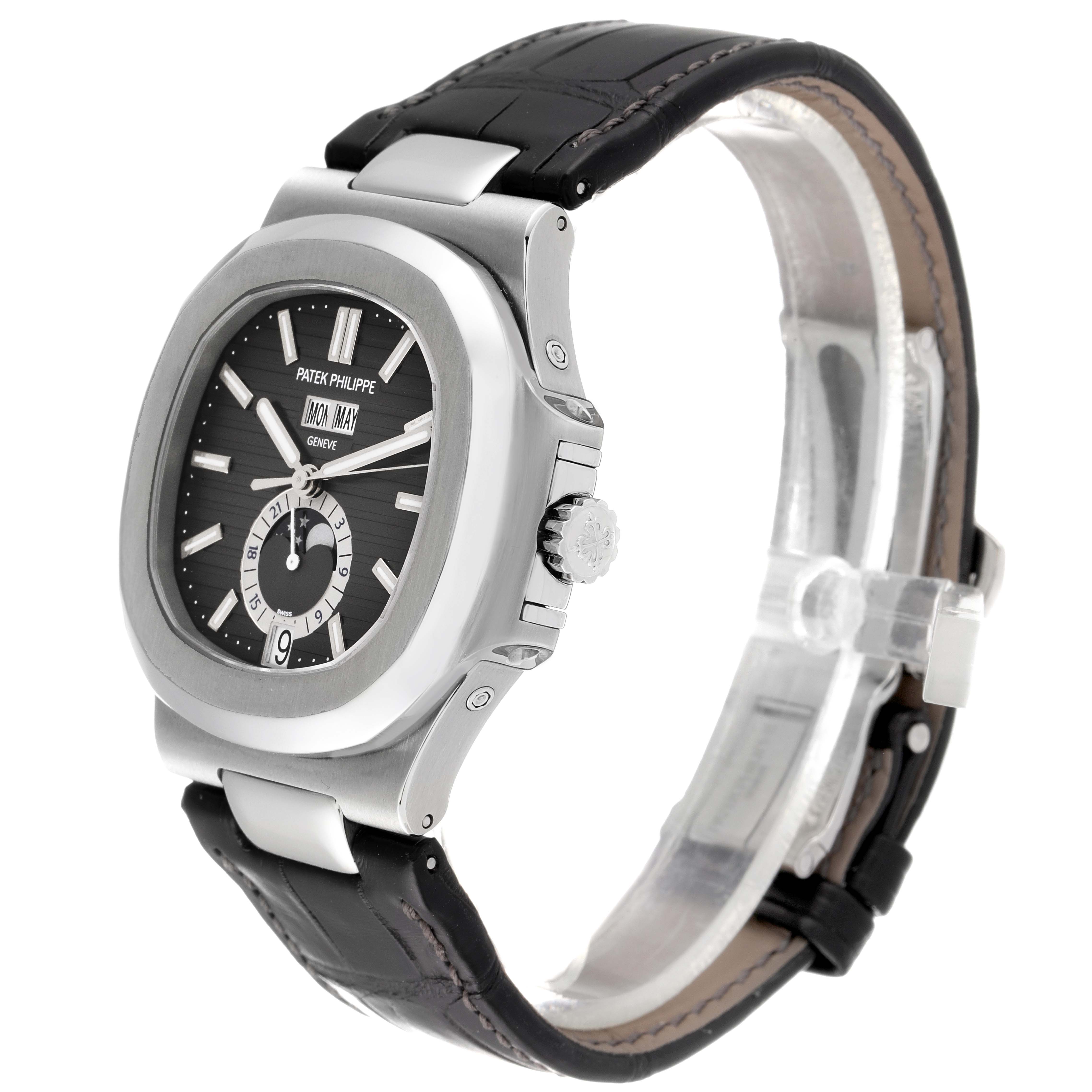 This Patek Philippe Nautilus 5726A-001 Men's Stainless Steel Black Dial 5726A-001 Men's Stainless Steel Black Dial watch is shown at an oblique angle highlighting the case, dial, crown, and leather strap.