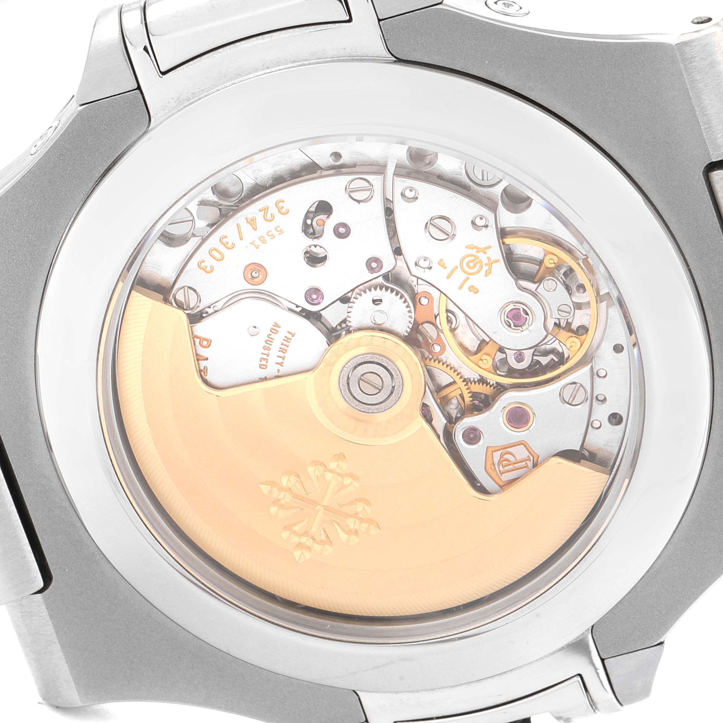 The image shows the back view of a Patek Philippe Nautilus 5726A-001 Men's Stainless Steel Black Dial 5726A-001 Men's Stainless Steel Black Dial watch, revealing the intricate internal movement components.