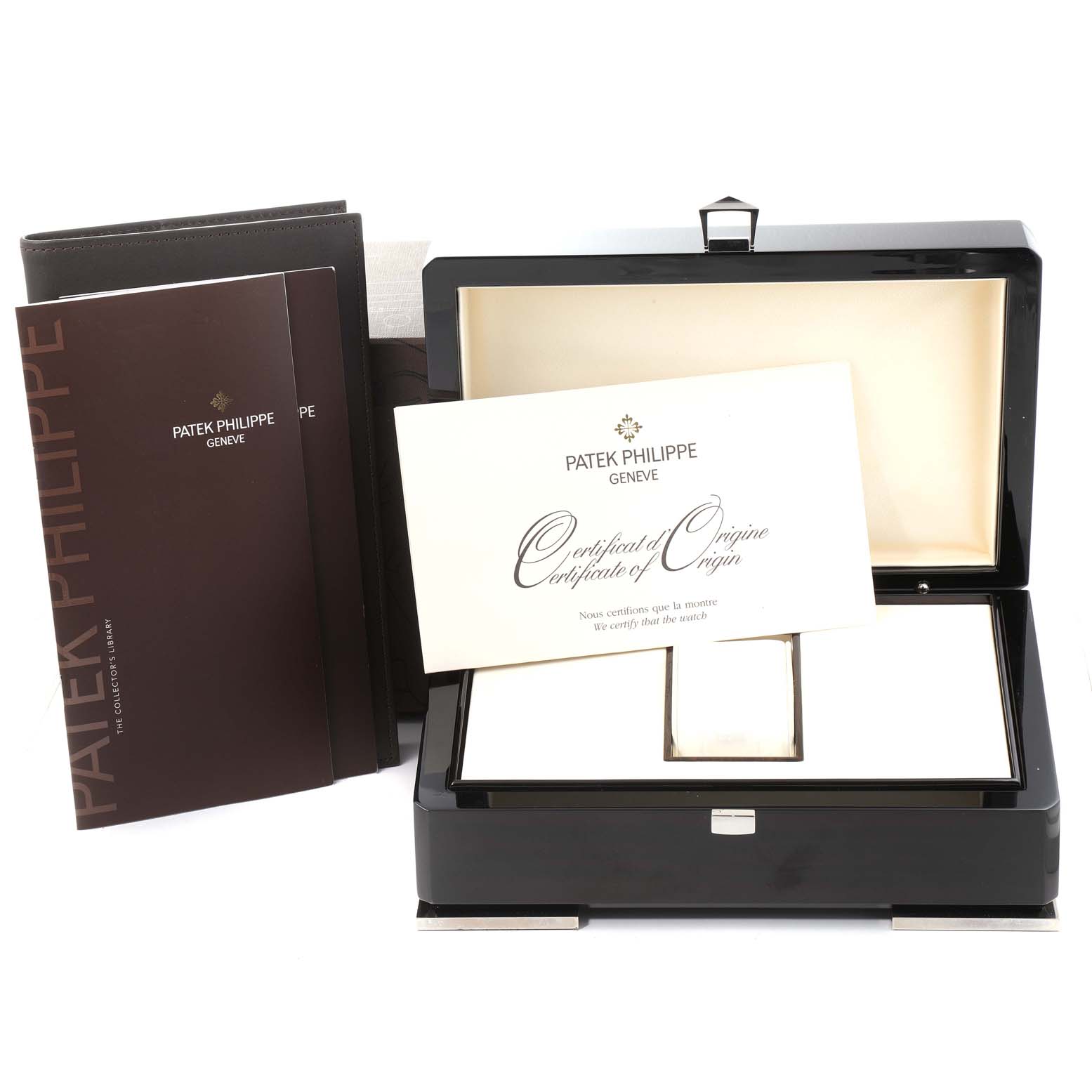 This image shows the packaging, certificate, and manuals for the Patek Philippe Nautilus 5726A-001 Men's Stainless Steel Black Dial 5726A-001 Men's Stainless Steel Black Dial watch.