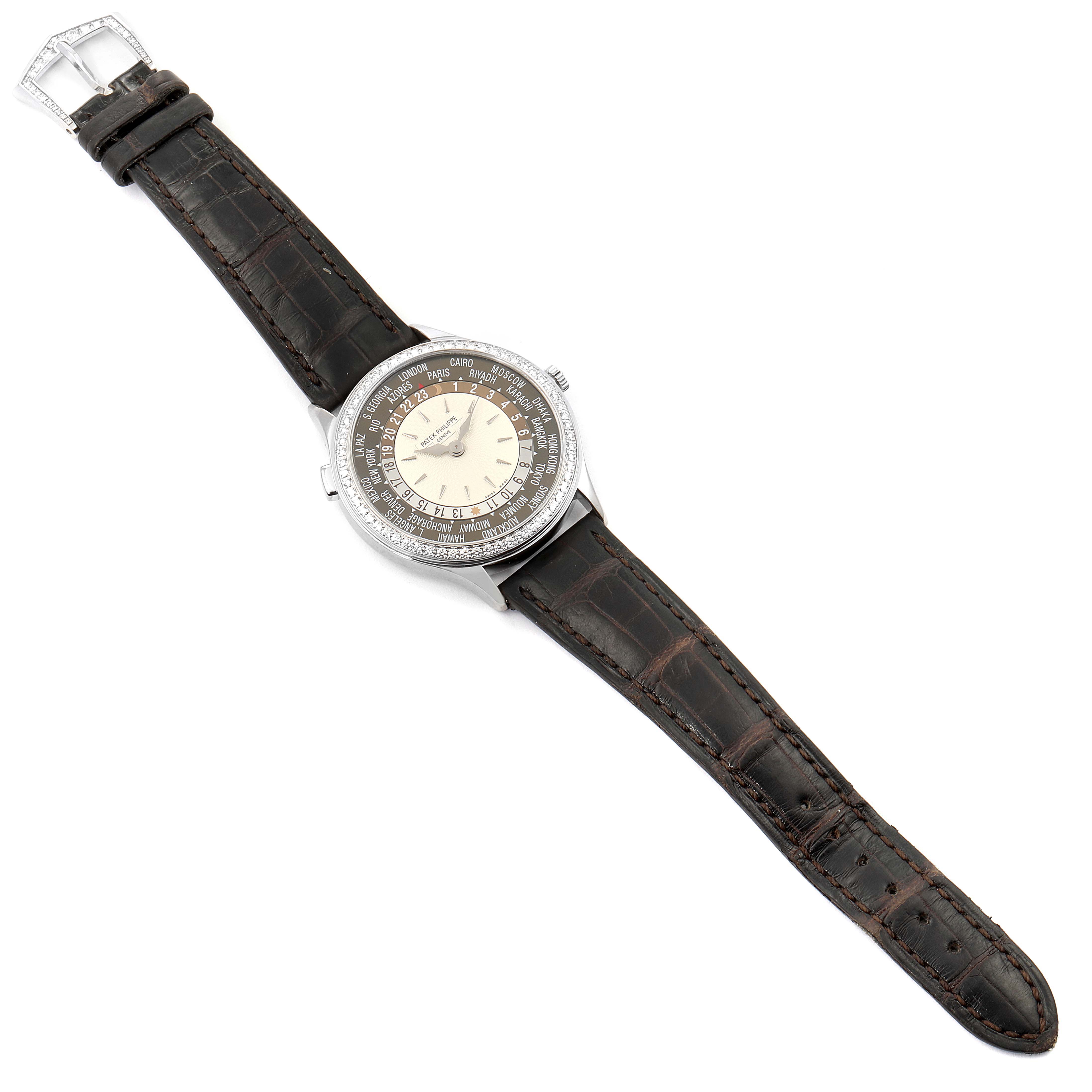 The image shows a full top-down view of a Patek Philippe Complications 7130G-001 Men's White Gold Brown Dial 7130G-001 Men's White Gold Brown Dial watch with a brown leather strap.