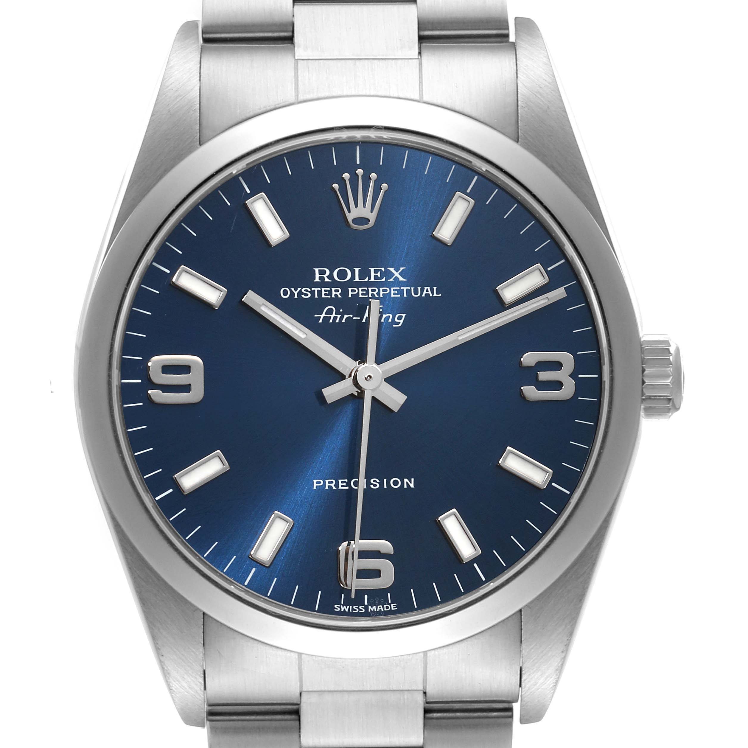 The image shows a front view of a Rolex Air-King 14000M Men's Stainless Steel Blue Dial 14000M Men's Stainless Steel Blue Dial watch, displaying its blue dial, hour markers, hands, and part of its stainless steel strap.