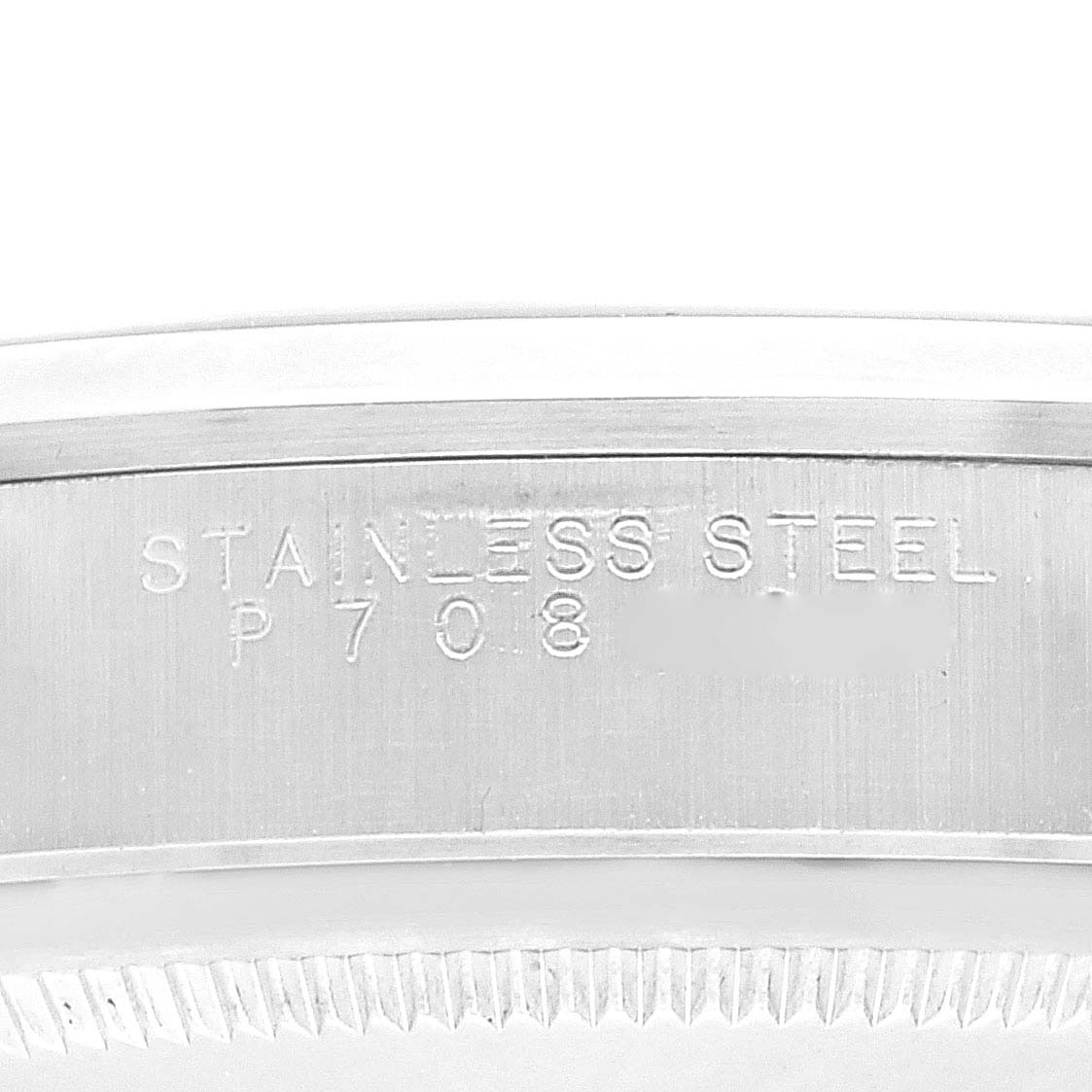 This is a close-up image of the stainless steel case side of a Rolex Air-King 14000M Men's Stainless Steel Blue Dial 14000M Men's Stainless Steel Blue Dial watch showing the engraved model number.
