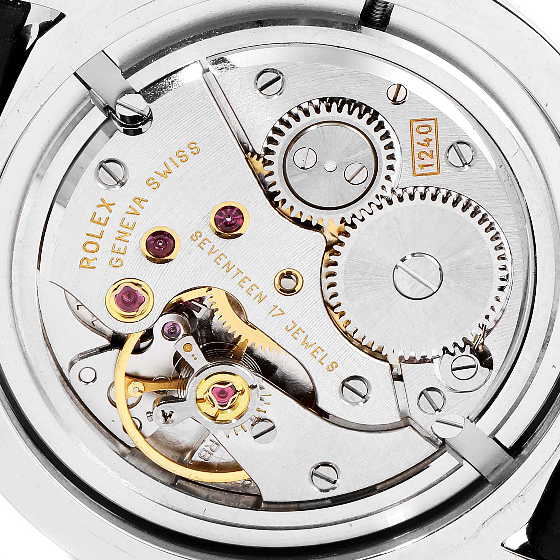 The image shows the intricate internal movement of the Rolex Cellini 5240 Men's Platinum Mother of Pearl Dial 5240 Men's Platinum Mother of Pearl Dial watch, including gears and jewels, from a top-down angle.