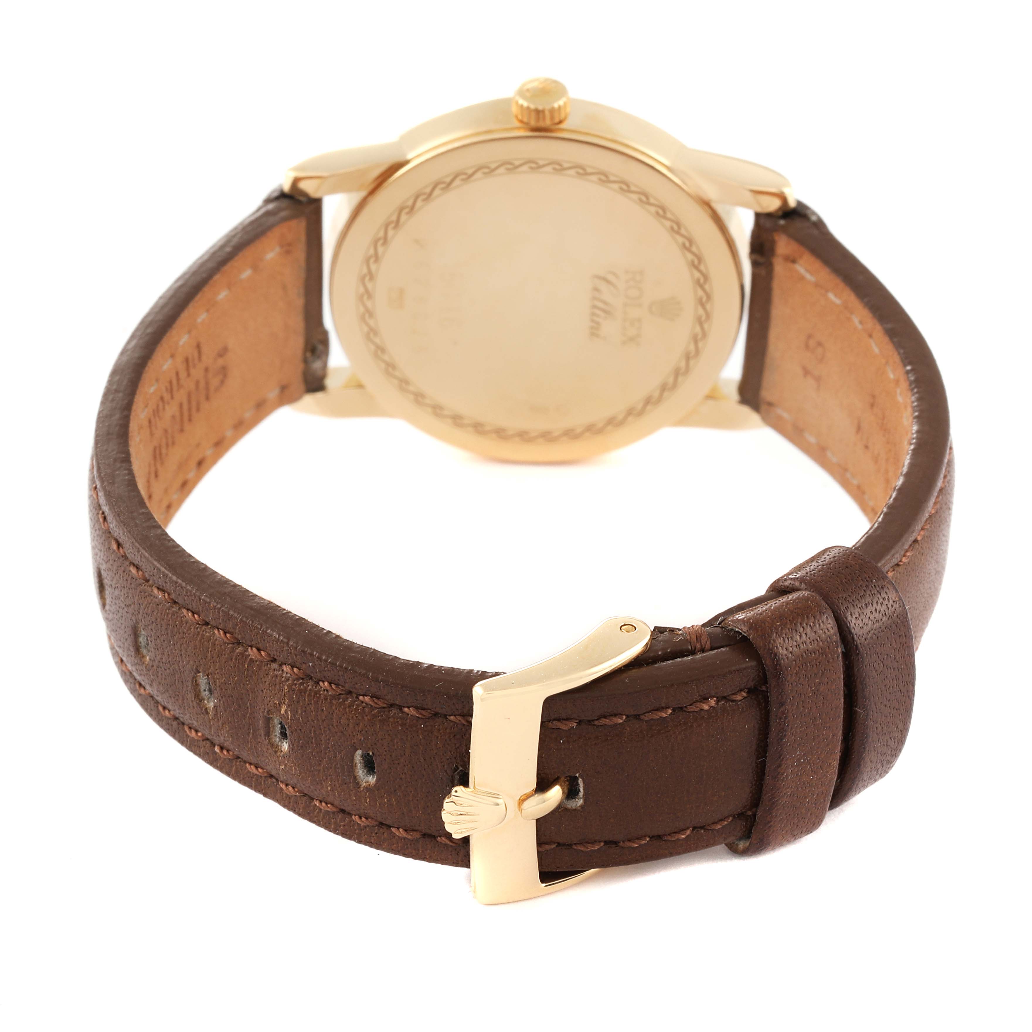 The image shows the back view of a Rolex Cellini 5116 Men
s Yellow Gold Mother of Pearl Dial 5116 Men
s Yellow Gold Mother of Pearl Dial watch highlighting the leather strap and buckle.