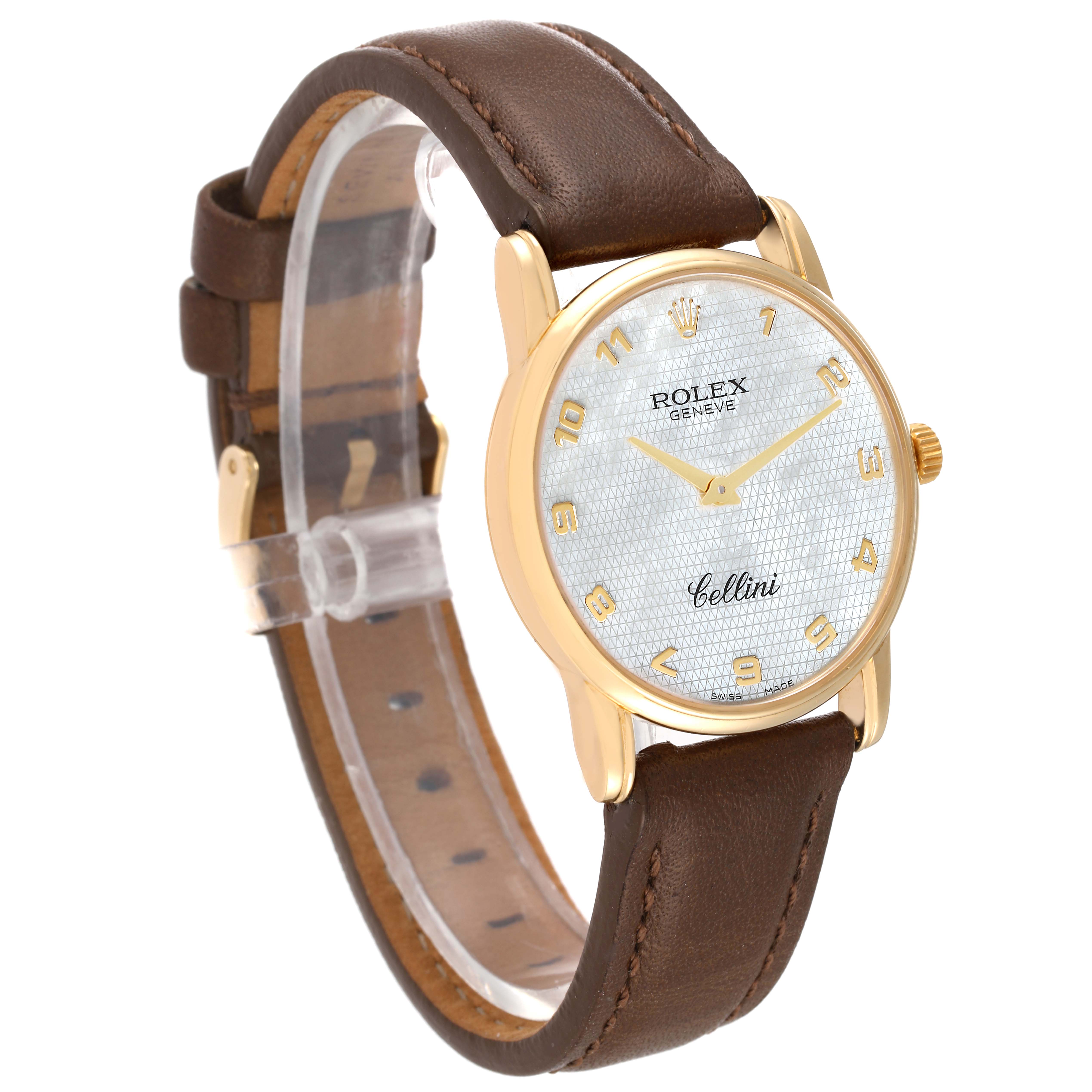This Rolex Cellini 5116 Men
s Yellow Gold Mother of Pearl Dial 5116 Men
s Yellow Gold Mother of Pearl Dial watch is shown at a slight angle, highlighting its gold case, white dial, and brown leather strap.