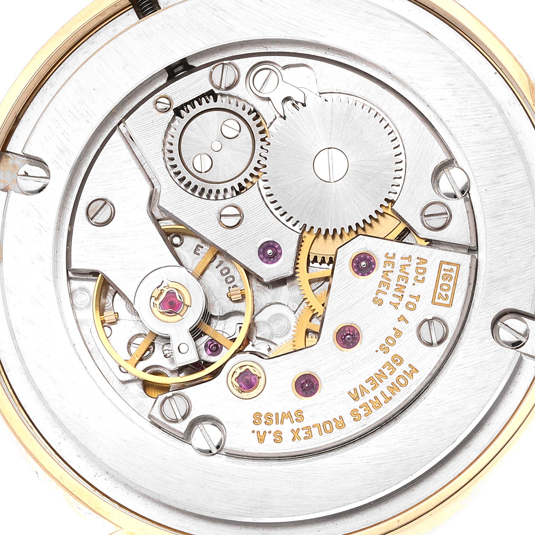 This image shows a close-up view of the movement mechanism inside a Rolex Cellini 5116 Men
s Yellow Gold Mother of Pearl Dial 5116 Men
s Yellow Gold Mother of Pearl Dial watch.