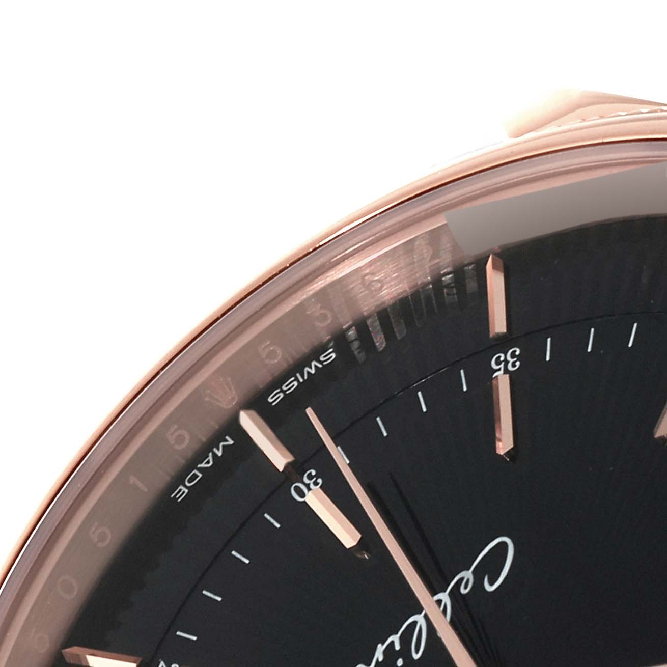 This close-up angle of the Rolex Cellini 50515 Men's Rose Gold Black Dial 50515 Men's Rose Gold Black Dial model watch shows part of the dial, minute markers, hour markers, and a portion of the bezel.