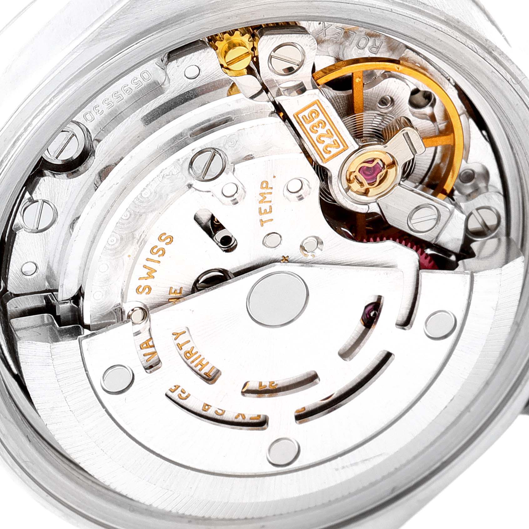 The image shows a close-up view of the internal mechanical movement of a Rolex Date 79160 Women
s Stainless Steel Pink Dial 79160 Women
s Stainless Steel Pink Dial model watch.