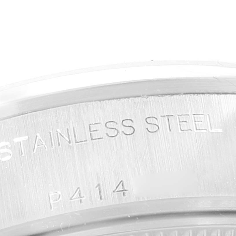 This image shows a close-up of the stainless steel back casing with engraving on the Rolex Date 79160 Women
s Stainless Steel Pink Dial 79160 Women
s Stainless Steel Pink Dial model watch.