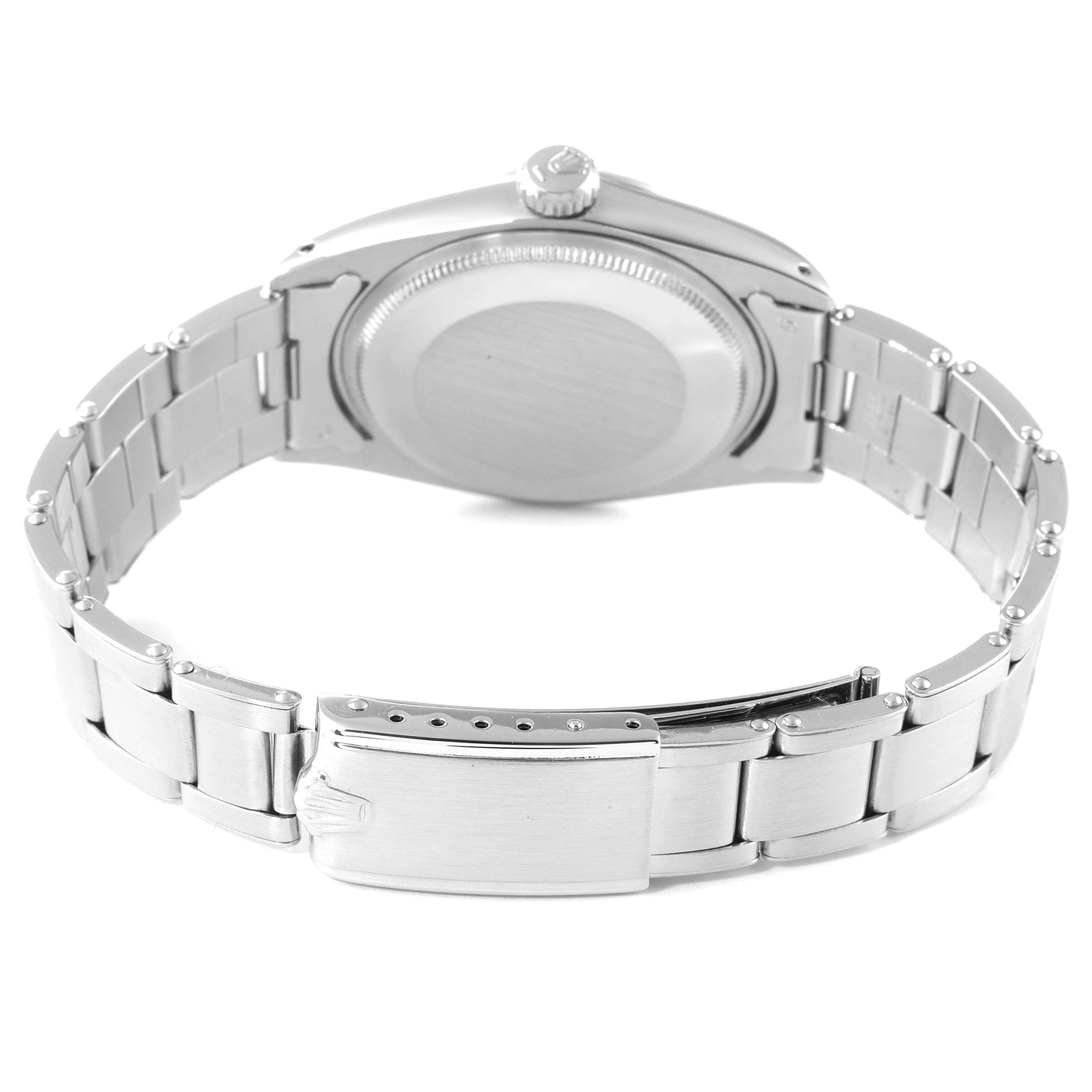 This is a rear view of a Vintage Collection model by Rolex, showing the bracelet, clasp, and case back.