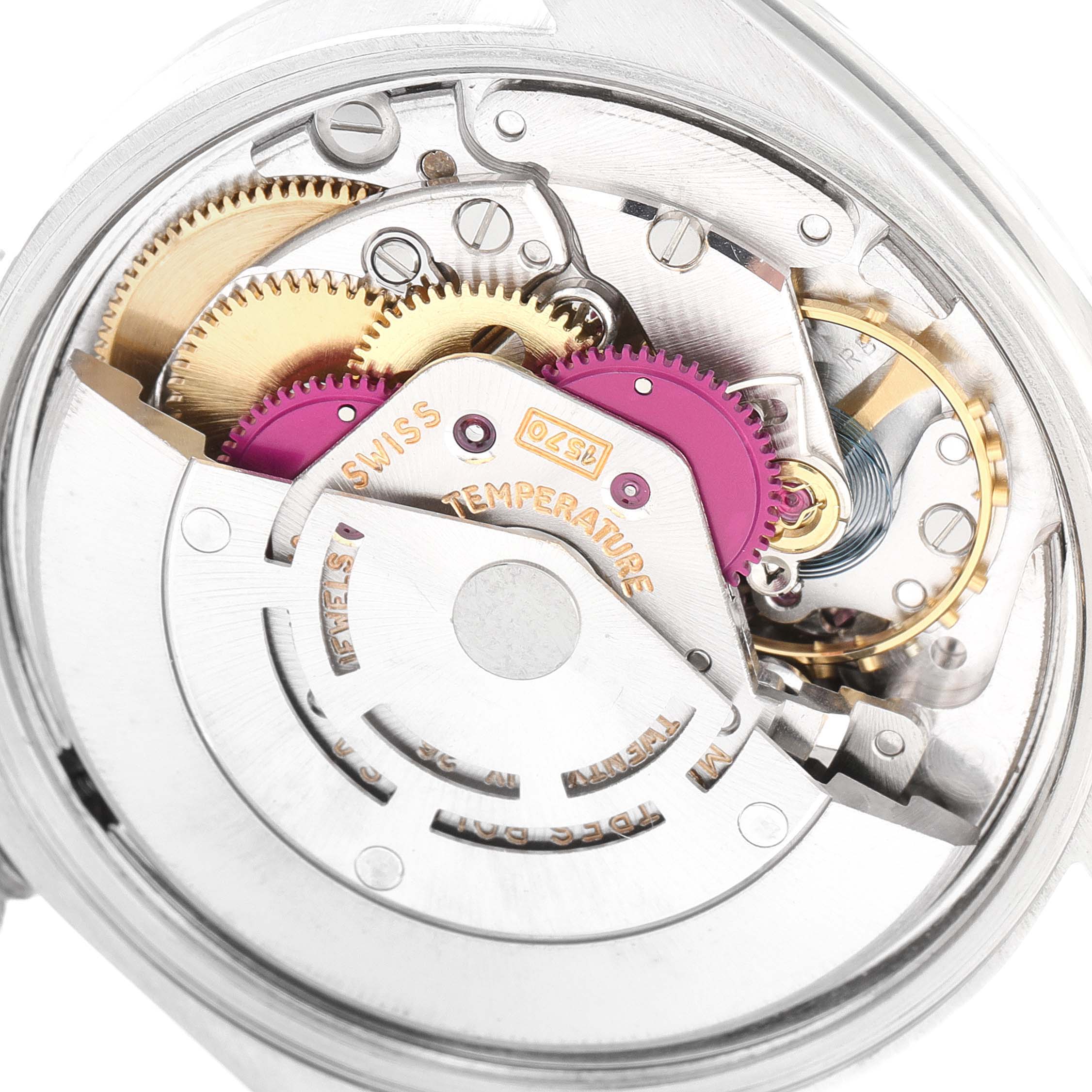 The image shows the intricate inner mechanism of the Rolex Vintage Collection 1500 Men
s Stainless Steel Silver Dial 1500 Men
s Stainless Steel Silver Dial watch at a close-up angle.