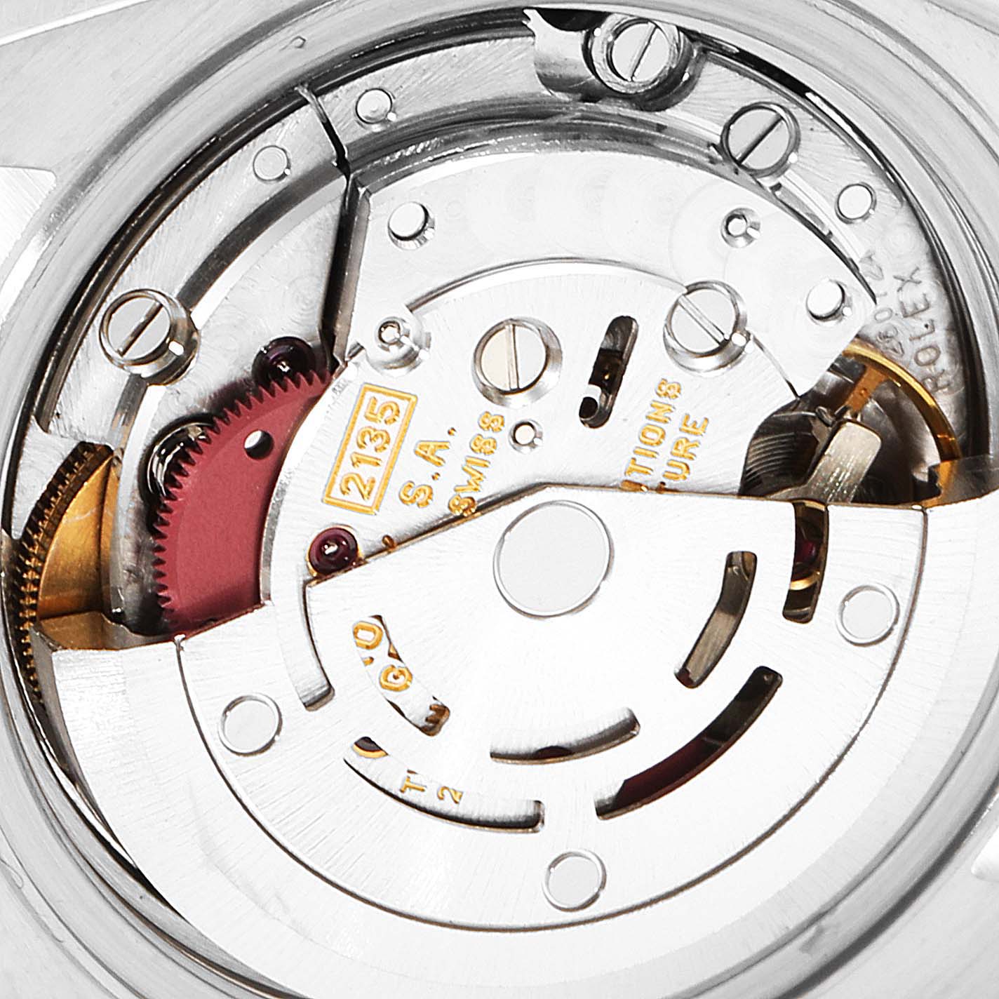 This image shows a close-up view of the movement inside a Rolex Datejust 69173 Women
s Steel and Gold (two tone) Champagne Dial 69173 Women
s Steel and Gold (two tone) Champagne Dial watch, highlighting its internal mechanical parts.