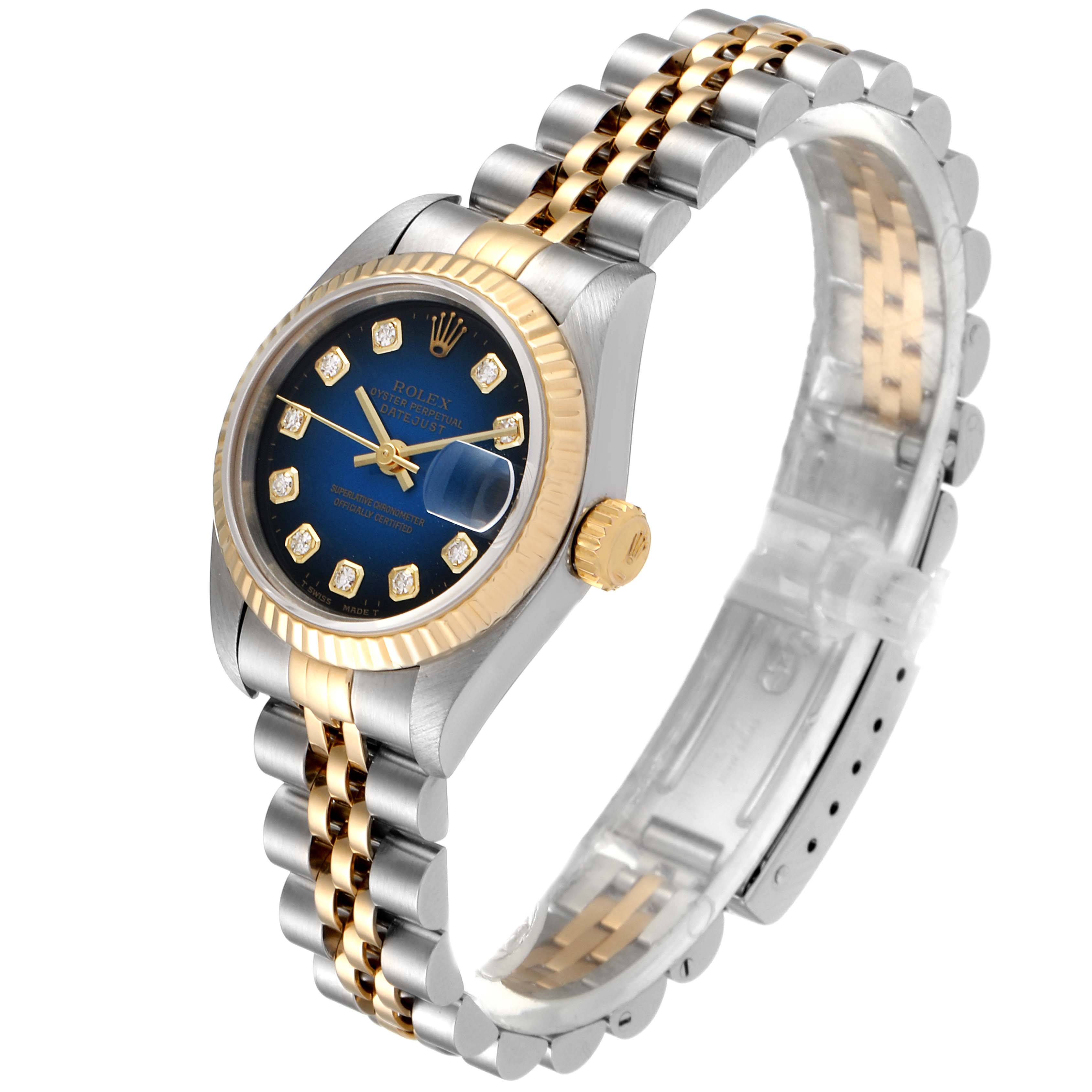 This image shows a Rolex Datejust 69173 Women
s Steel and Gold (two tone) Blue Dial 69173 Women
s Steel and Gold (two tone) Blue Dial watch with a gold and silver bracelet, blue dial, and a cyclops lens over the date window, viewed at an angle.