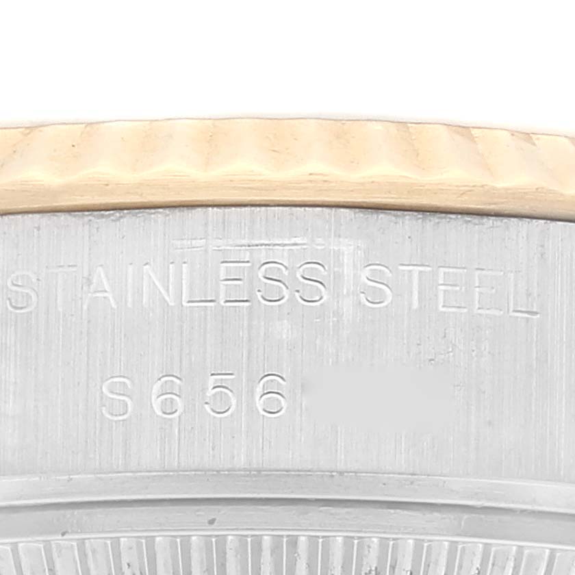 The image shows a close-up view of the side of a Rolex Datejust 69173 Women's Steel and Gold (two tone) White Dial 69173 Women's Steel and Gold (two tone) White Dial watch, highlighting the stainless steel and the reference number.