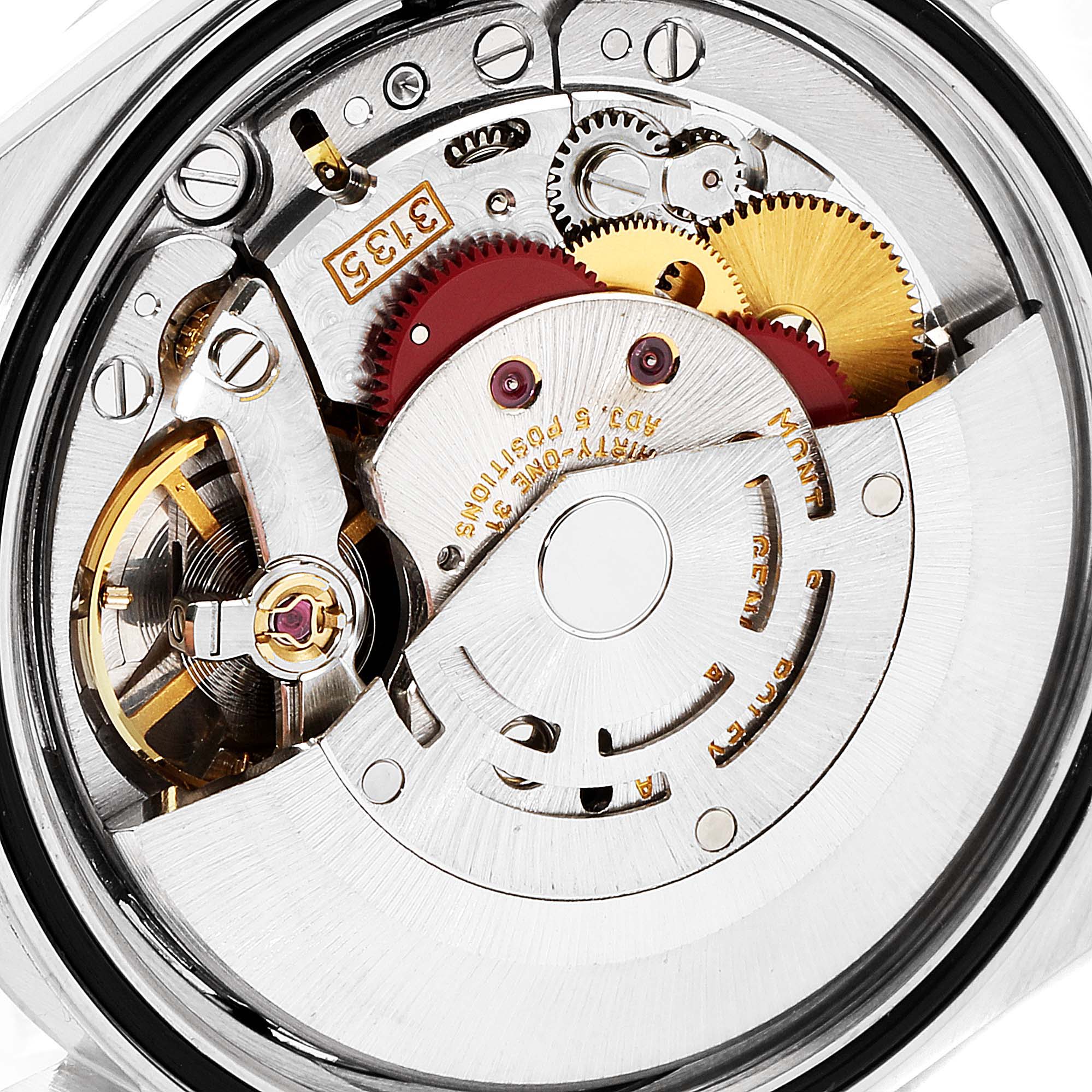 The image shows the movement mechanism of a Rolex Datejust 16234 Men
s Stainless Steel Blue Dial 16234 Men
s Stainless Steel Blue Dial watch from a close-up rear angle.