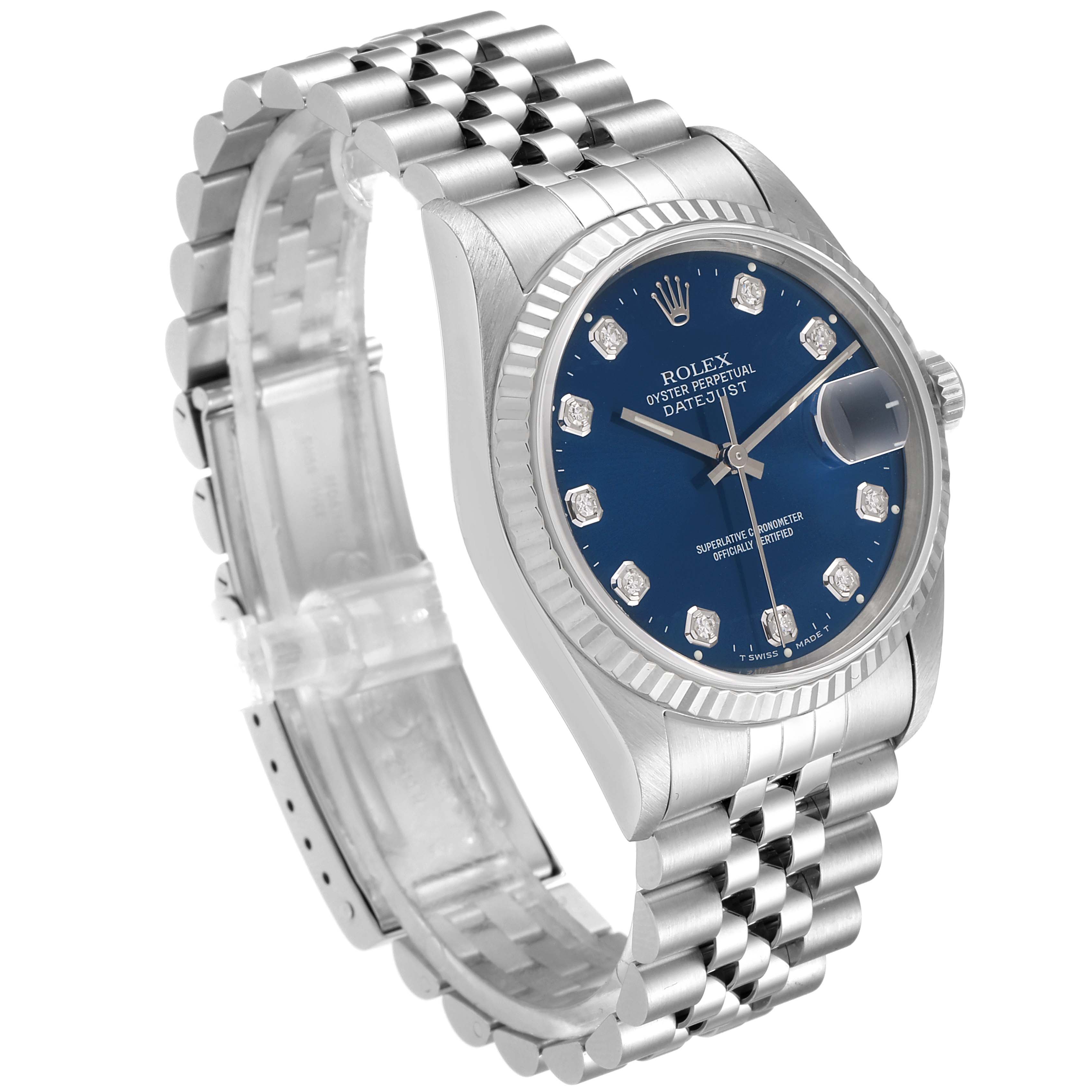 The Rolex Datejust 16234 Men
s Stainless Steel Blue Dial 16234 Men
s Stainless Steel Blue Dial watch is shown from a three-quarter angle displaying the dial, bezel, case, and bracelet.