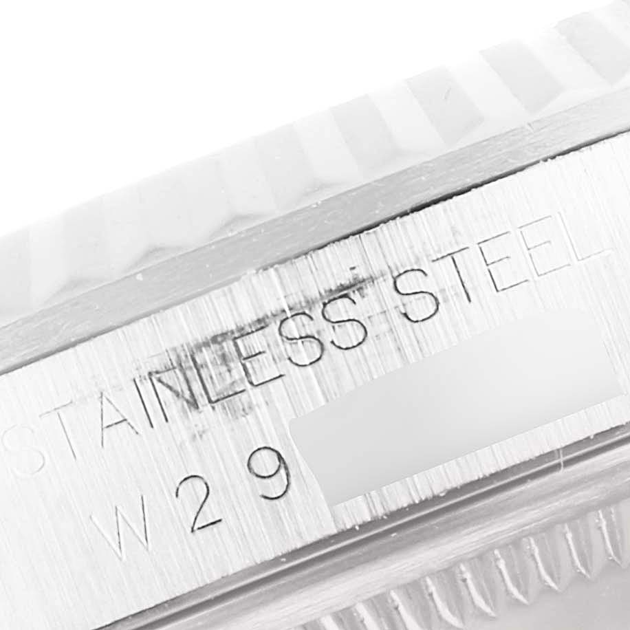 This image shows a close-up of the stainless steel side and bezel of a Rolex Datejust 16234 Men
s Stainless Steel Blue Dial 16234 Men
s Stainless Steel Blue Dial watch.