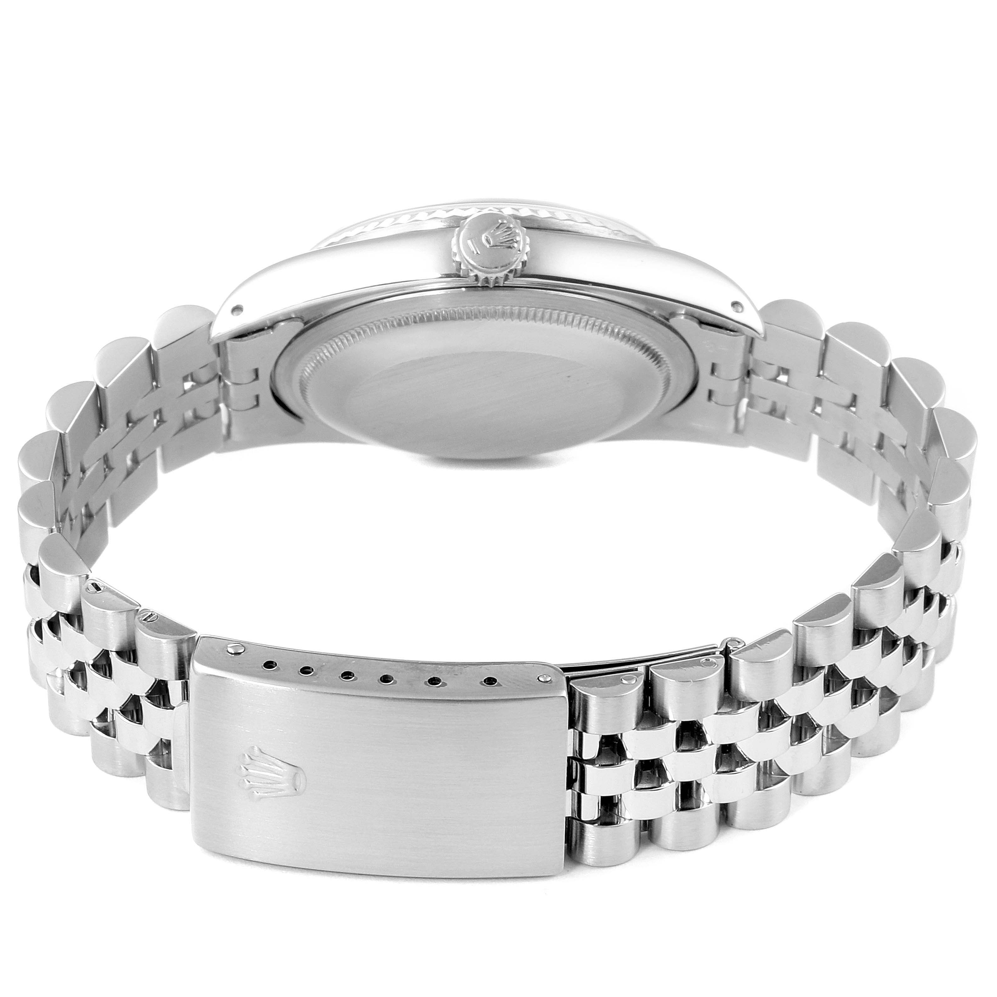 The image shows the back view of a Rolex Datejust 16234 Men
s Stainless Steel White Dial 16234 Men
s Stainless Steel White Dial watch, highlighting the caseback, crown, and Jubilee bracelet with clasp.