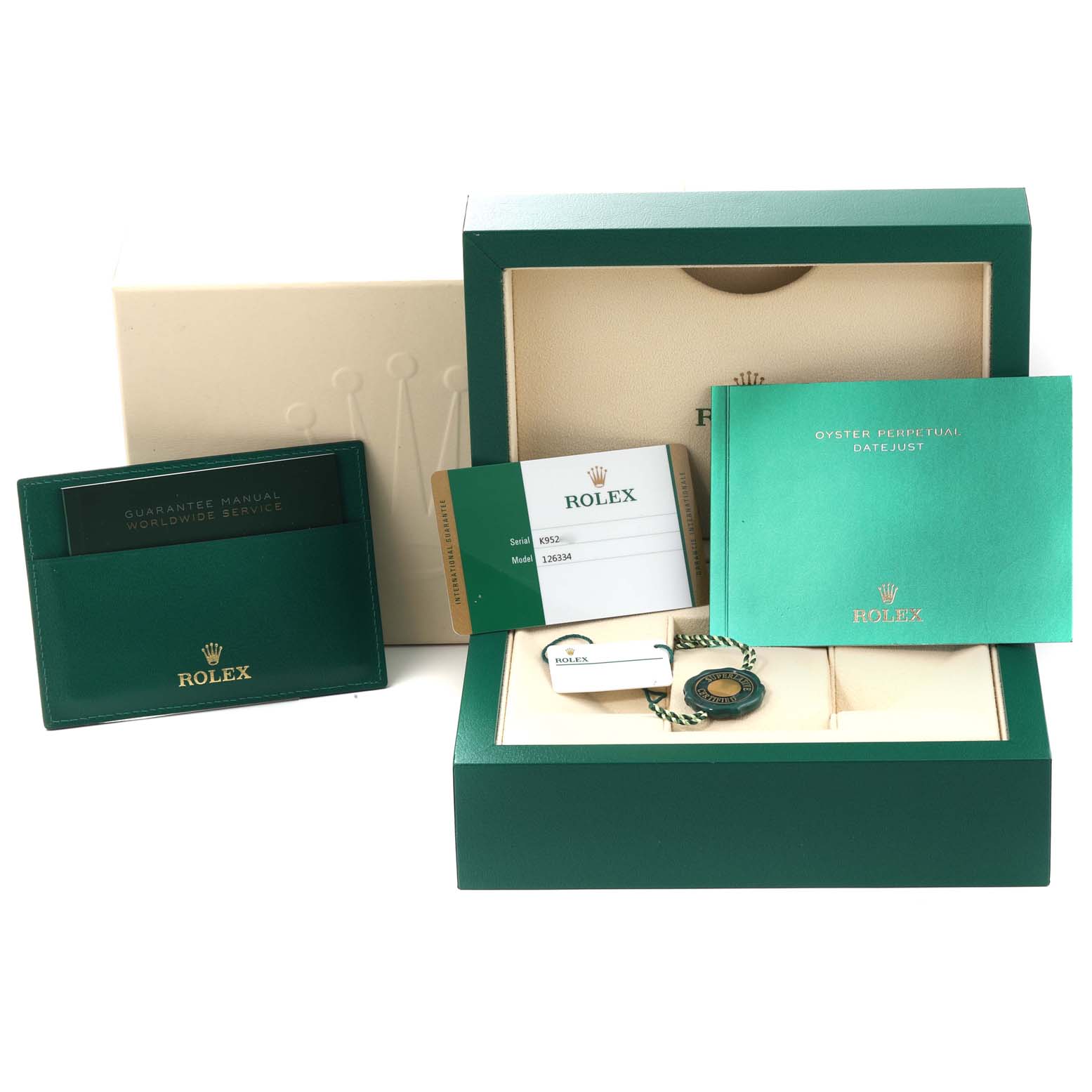 This image shows the packaging and accompanying accessories for the Rolex Datejust 41 126334 Men
s Stainless Steel Blue Dial 126334 Men
s Stainless Steel Blue Dial, including the box, manuals, and warranty card.