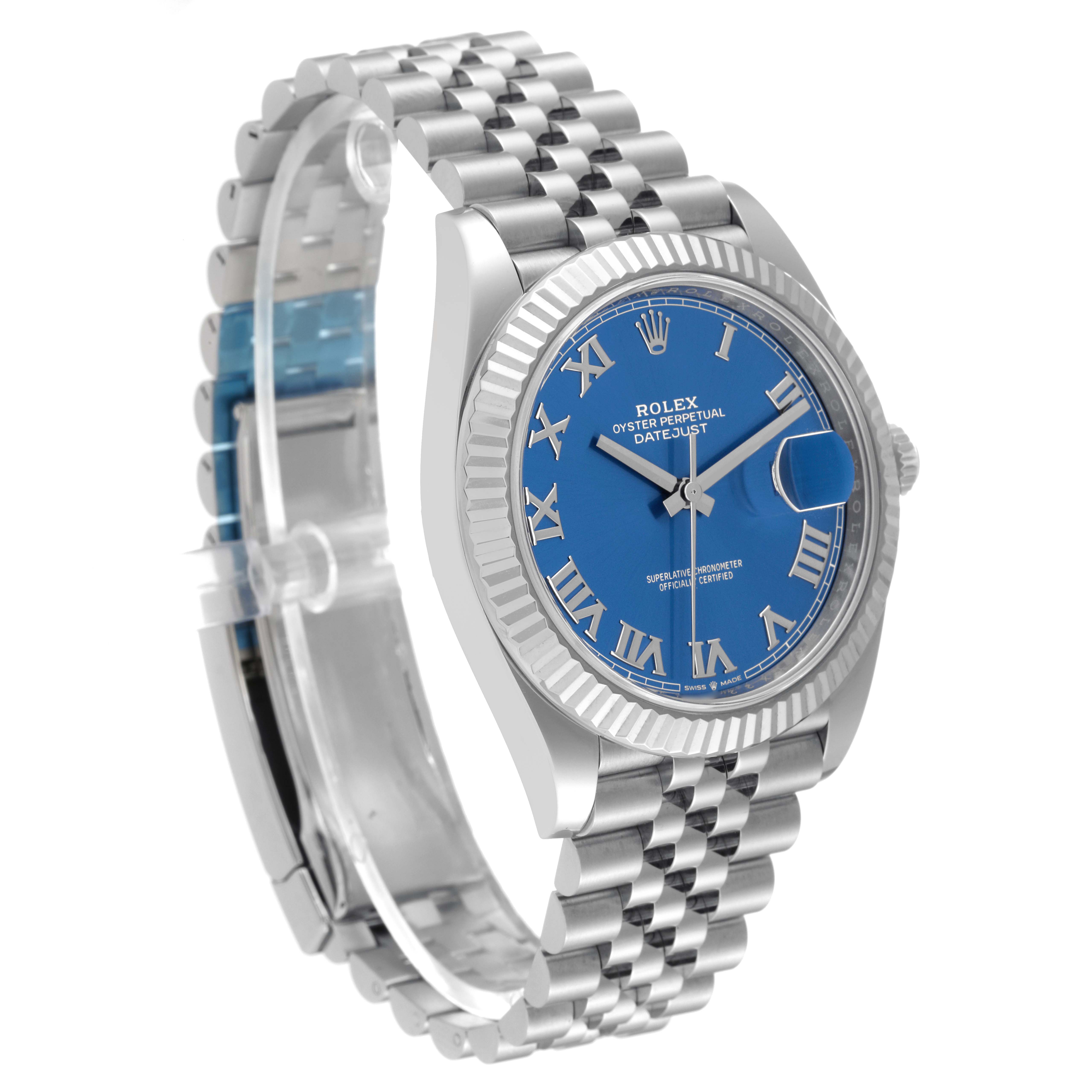 The Rolex Datejust 41 126334 Men
s Stainless Steel Blue Dial 126334 Men
s Stainless Steel Blue Dial is shown at a three-quarter angle, showcasing its blue dial, Roman numeral markers, fluted bezel, and Jubilee bracelet.