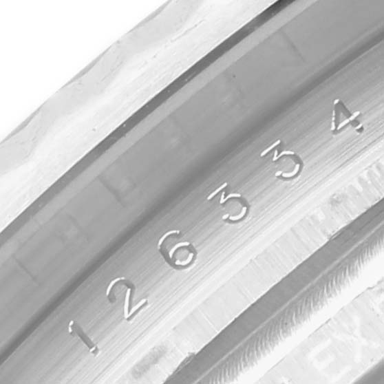 The image shows a close-up view of the fluted bezel and model number engraving on a Rolex Datejust 41 126334 Men
s Stainless Steel Grey Dial 126334 Men
s Stainless Steel Grey Dial watch.