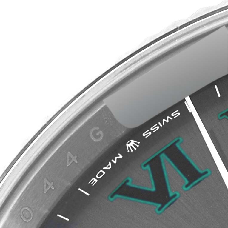 This image shows a close-up of the lower part of the dial of a Rolex Datejust 41 126334 Men
s Stainless Steel Grey Dial 126334 Men
s Stainless Steel Grey Dial, including its "Swiss Made" label and part of the Roman numeral VI.