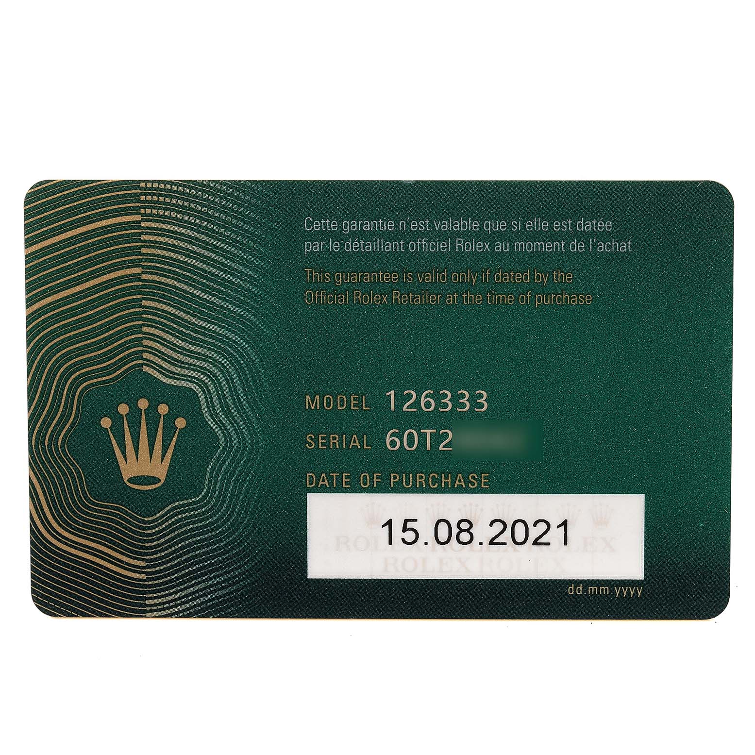 This is a close-up of the warranty card for the Rolex Datejust 41 126333 Men's Steel and Gold (two tone) Grey Dial 126333 Men's Steel and Gold (two tone) Grey Dial model 126333, showing the model, serial number, and date of purchase.