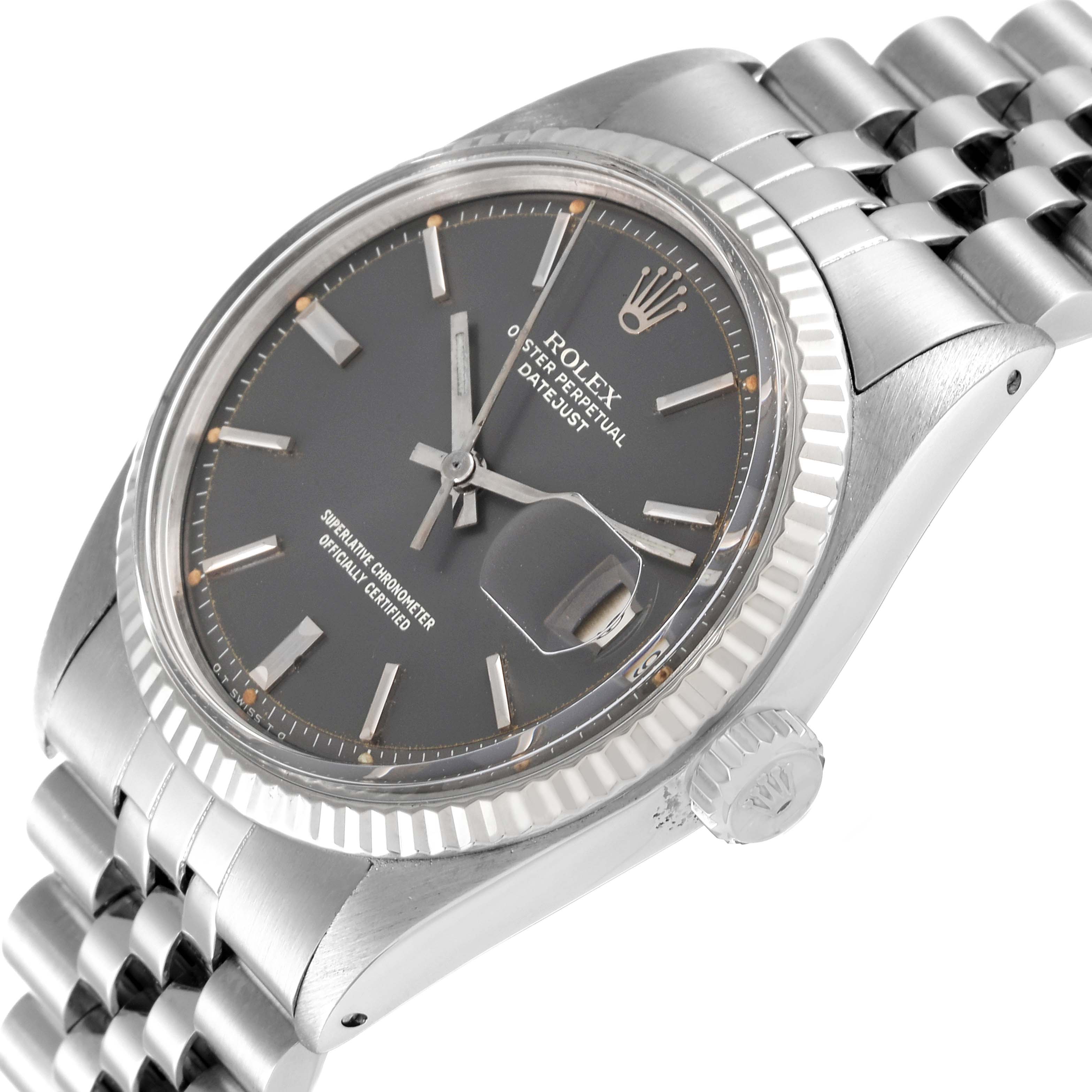 The image shows a Vintage Collection Rolex watch from an angled view, highlighting the face, bezel, crown, and part of the bracelet.